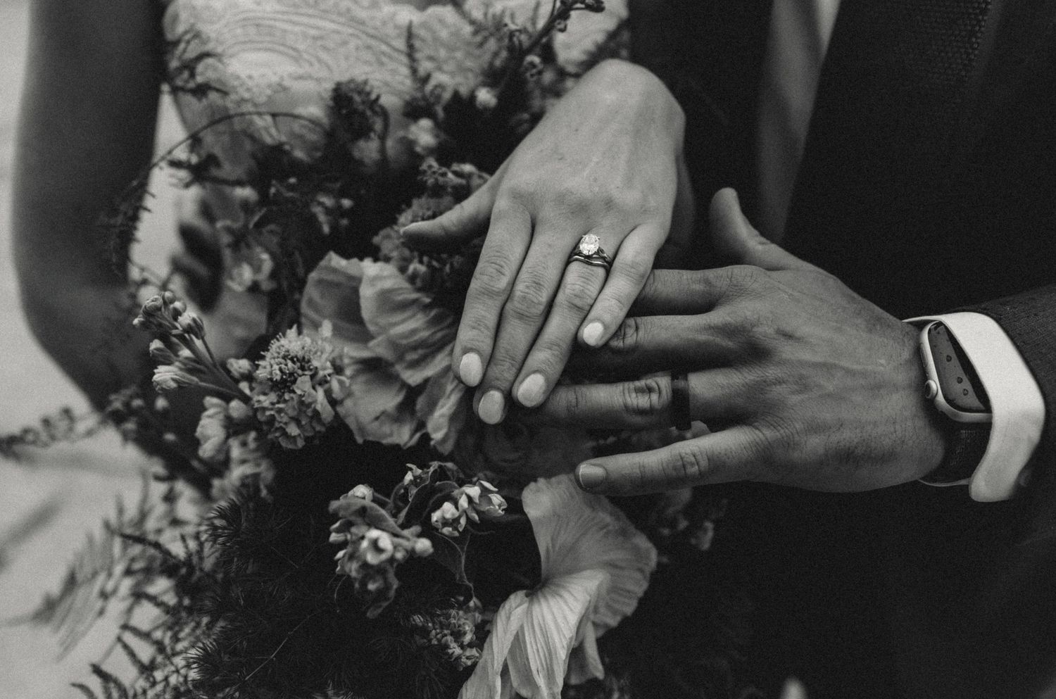 Bride and groom ring and bouquet detail photo during wedding portraits with illinois wedding photographer