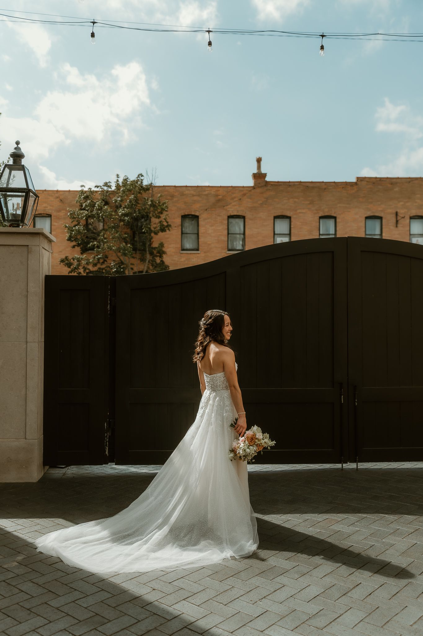 Bride during her bridal portraits on a sunny summer day captured by illinois wedding photographer