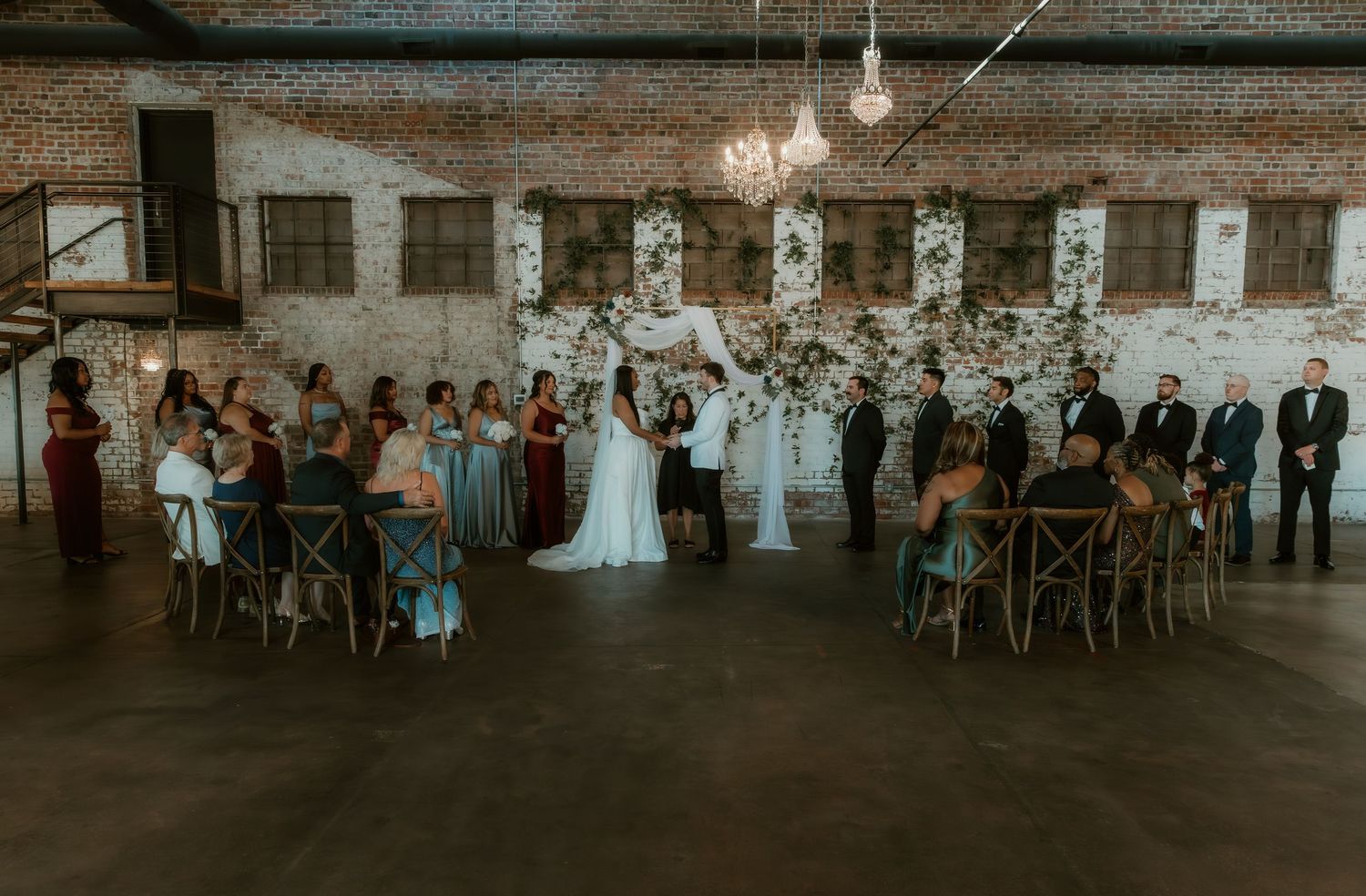 Bride and Groom wedding ceremony documented by illinois wedding photographer at Venue Chisca in Peoria, IL