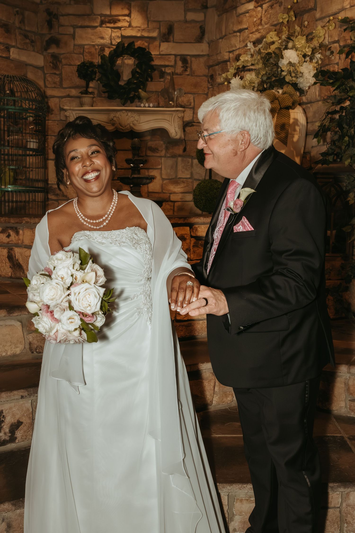 Bride and Groom share a playful laugh during their wedding portraits with illinois wedding photographer