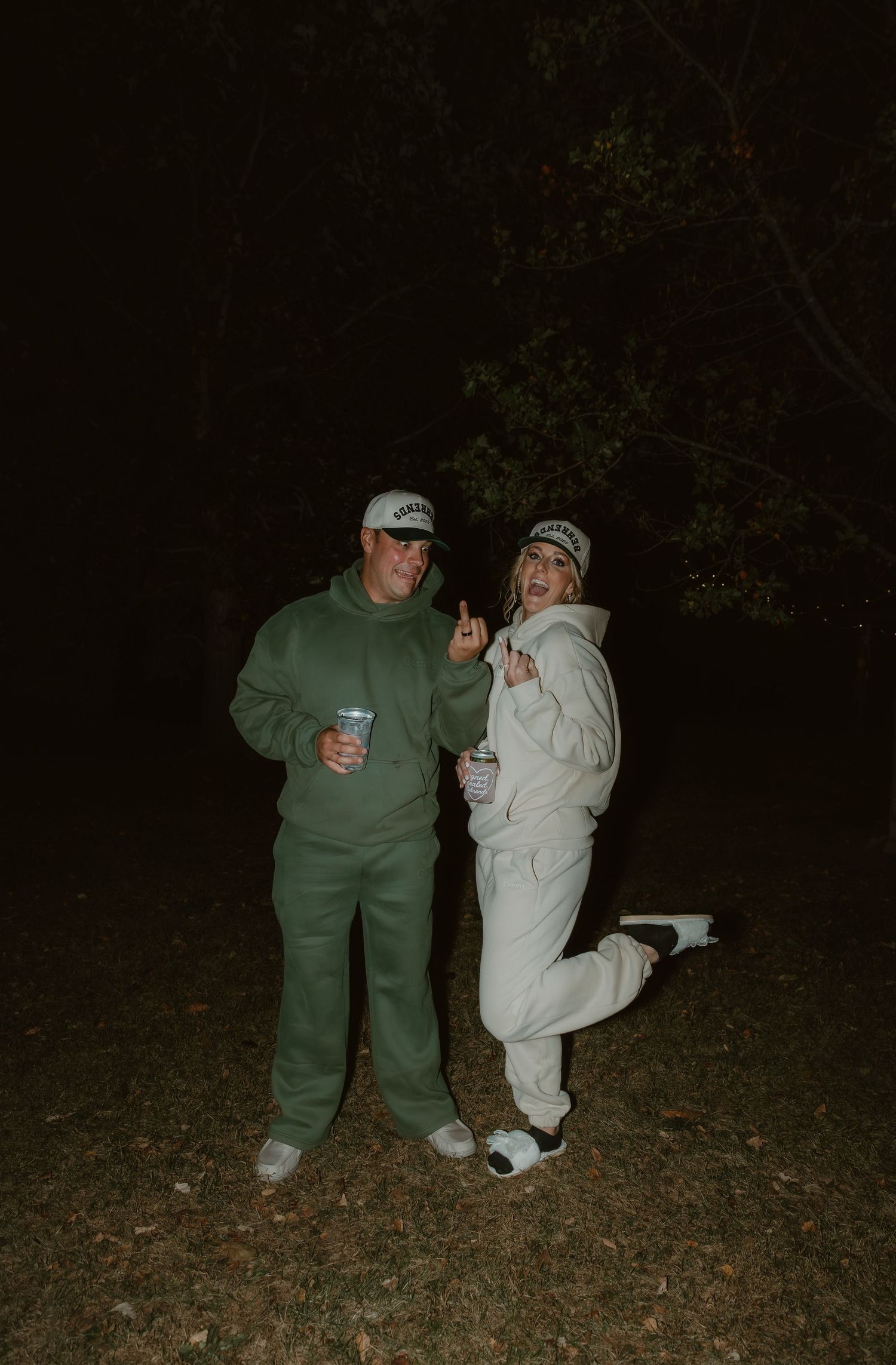 Bride and Groom change into sweatsuits for their wedding reception captured by illinois wedding photographer