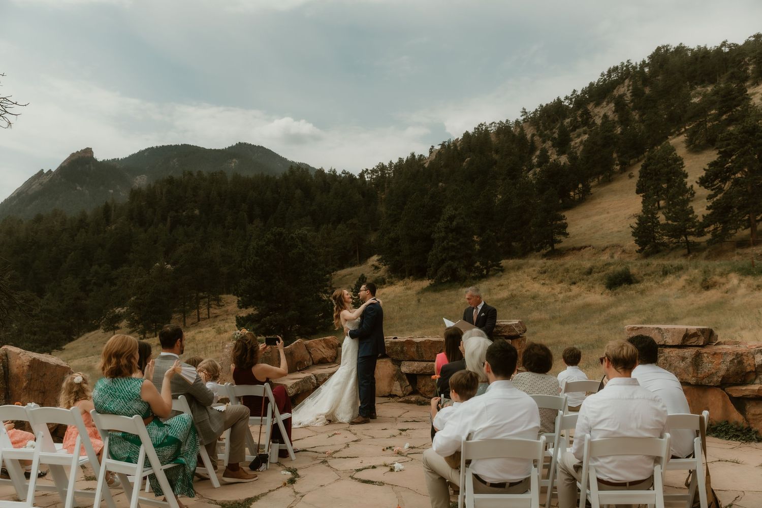 Bride and Groom during their wedding ceremony with their loved ones