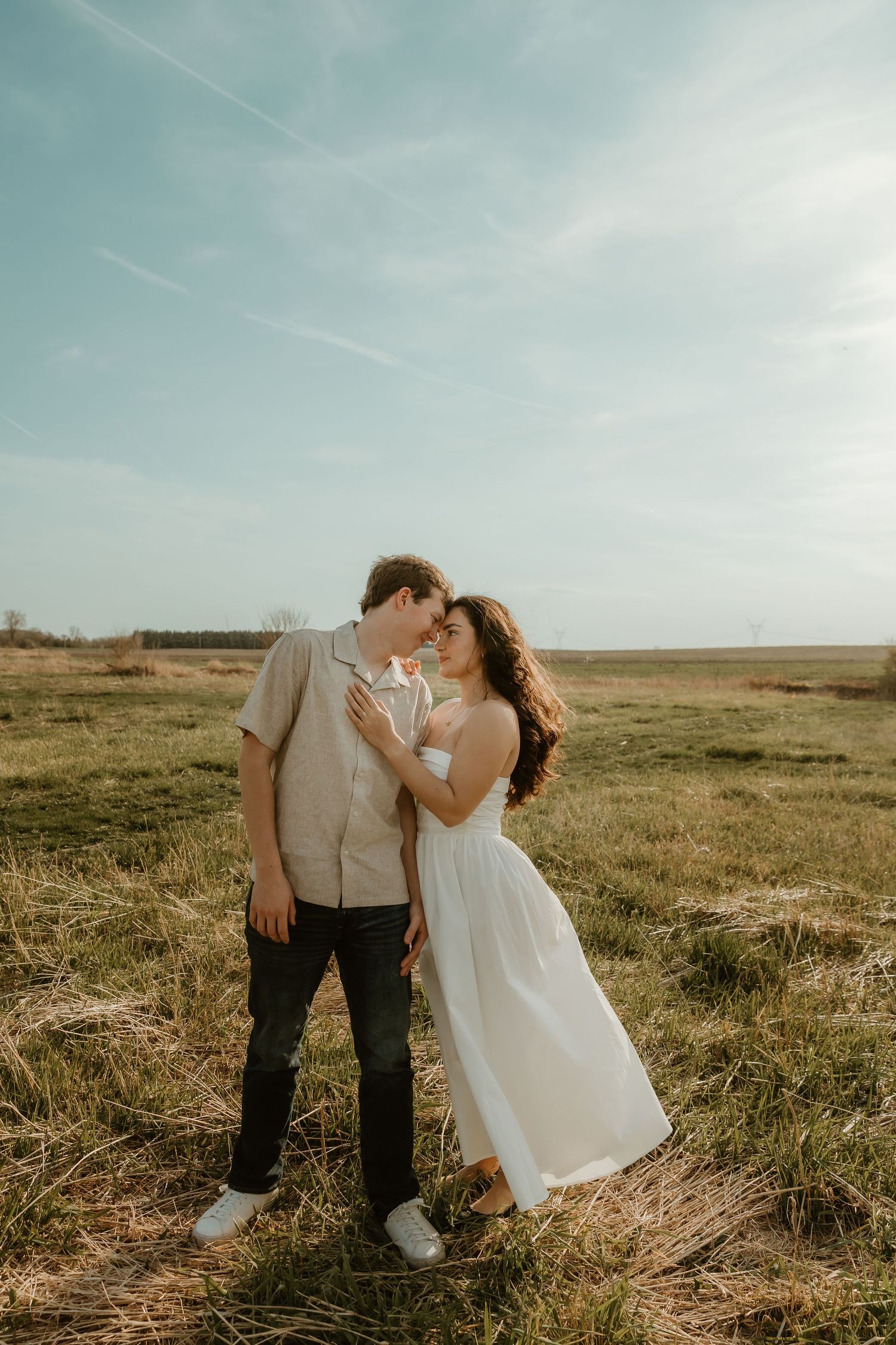 Couple stares intimately at each other for a sweet moment during engagement session with central il photographer