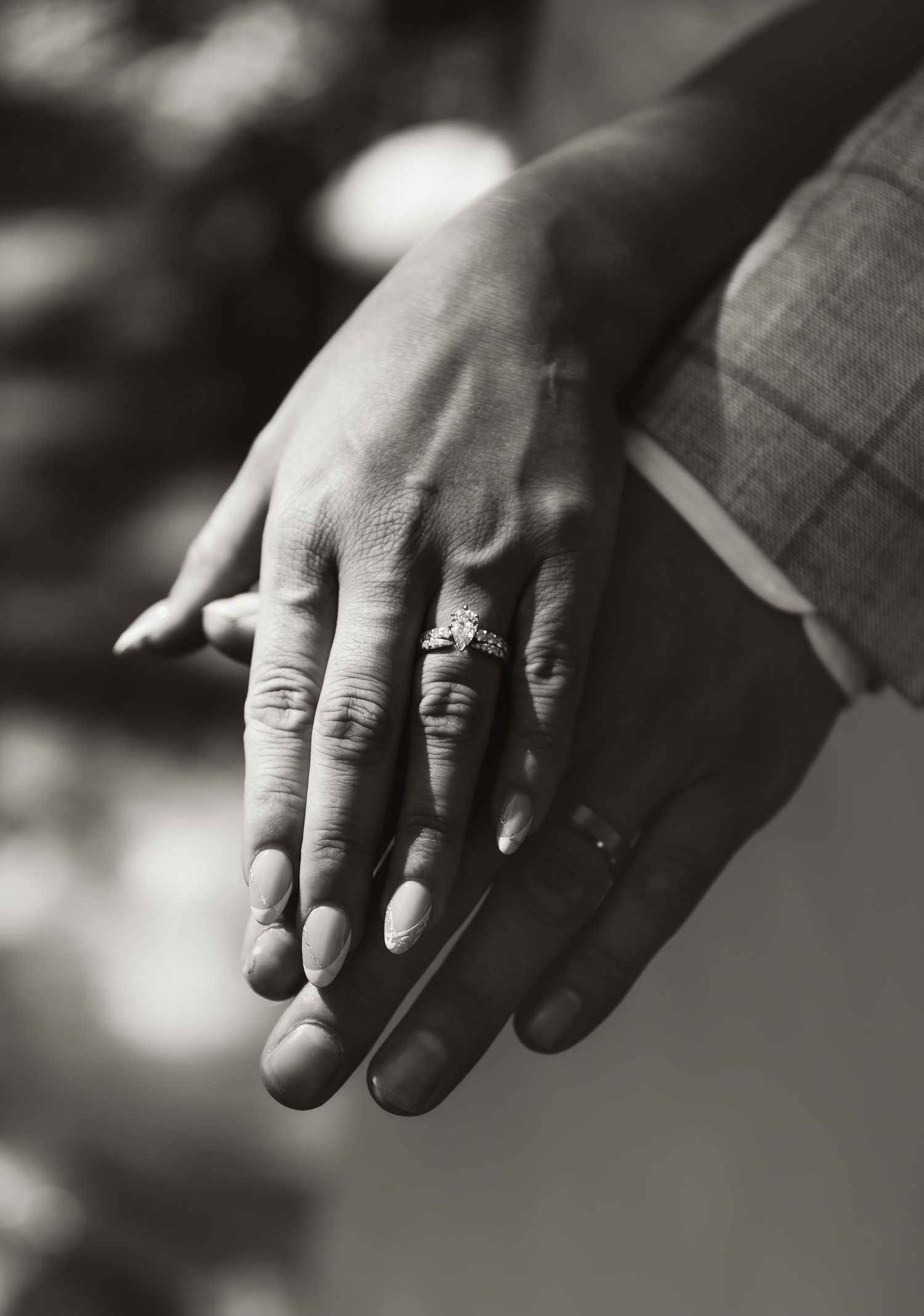 Bloomington, IL photographer captures close-up of hands with wedding rings—intimate, timeless love captured in soft, emotive detail