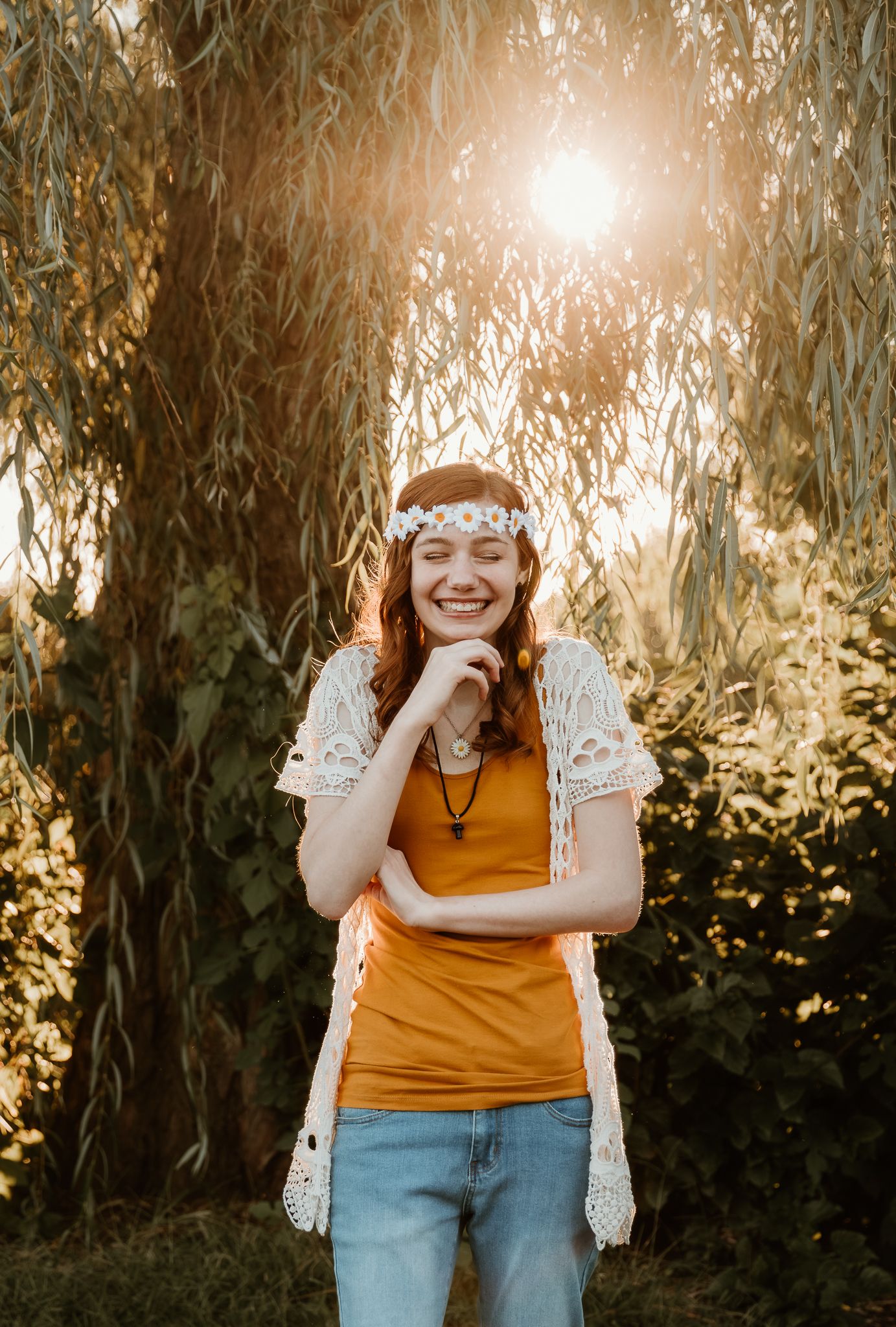 High school senior shows her personality through clothing accessories during senior photo session with central il photographer