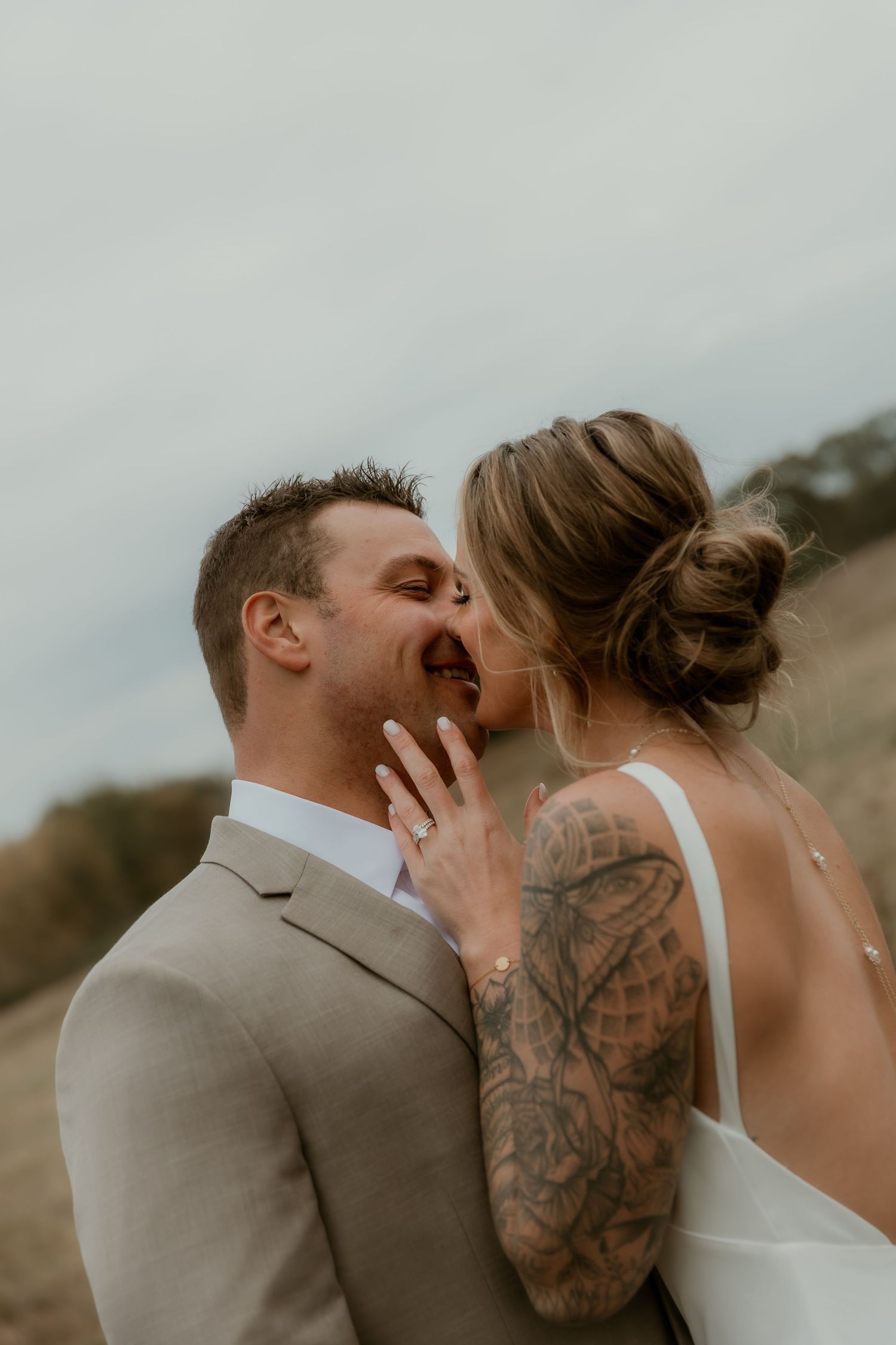 Bride and Groom share a kiss during their wedding portraits with illinois wedding photographer