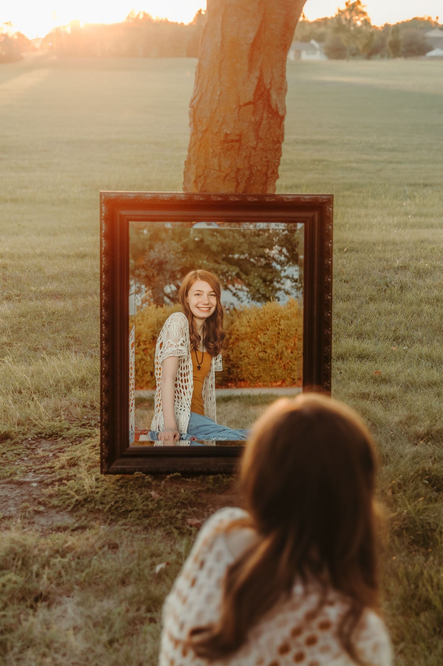 High school senior is taking in her looks, achievements, personality, and reminiscing on the last year of high school