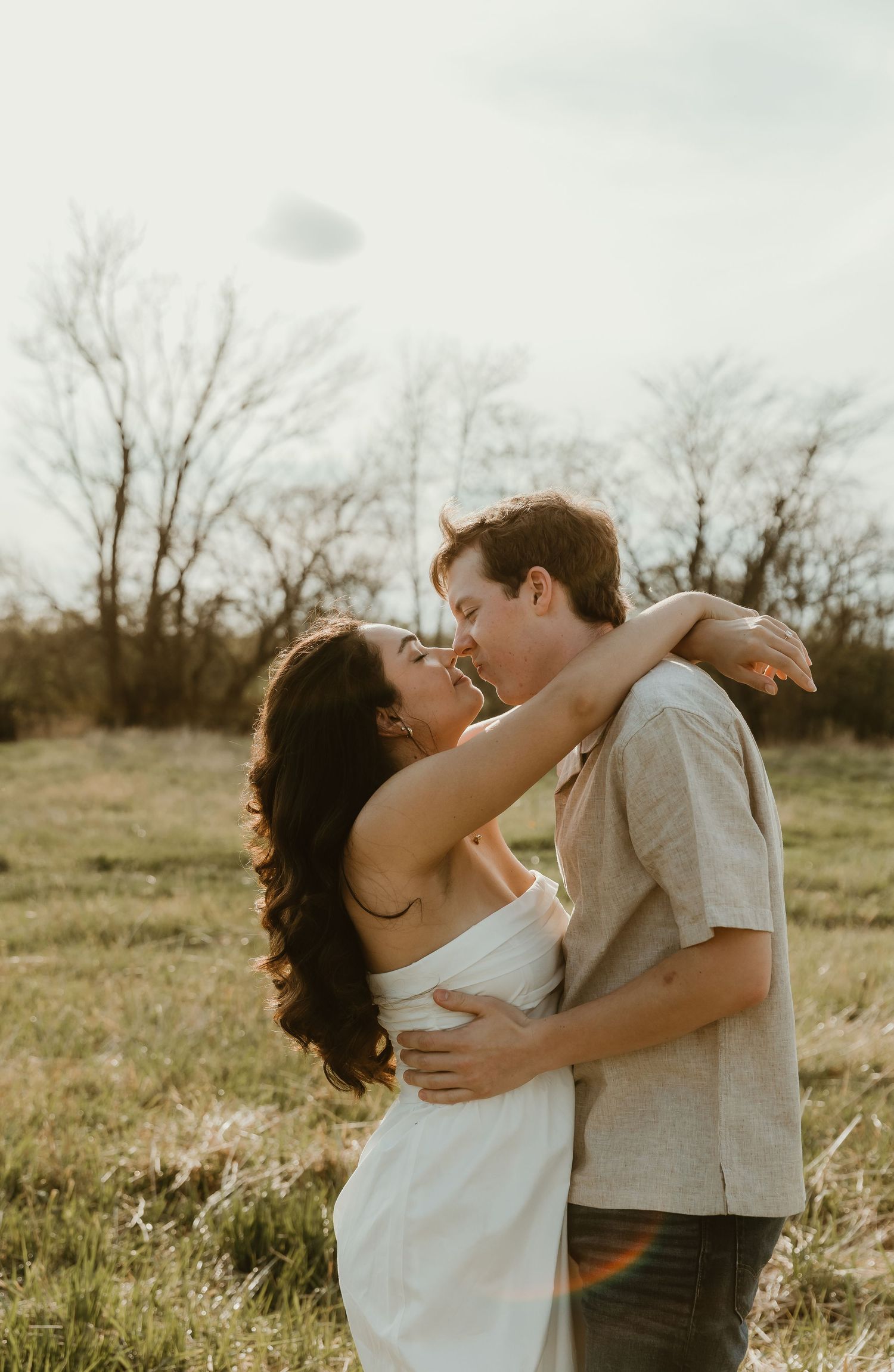 Couple sharing an intimate moment with each other during their engagement session photographed by central illinois photographer