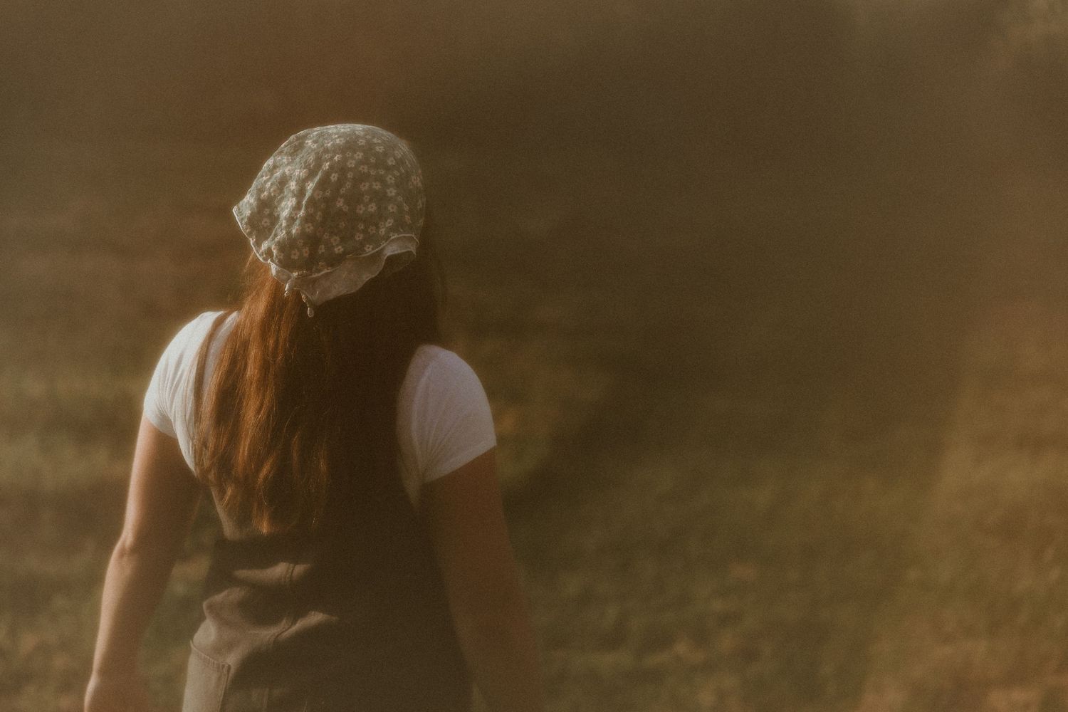 Sehl Photography Bloomington IL photographer captures a serene, nostalgic portrait—soft focus, headscarf detail, and quiet outdoor warmth