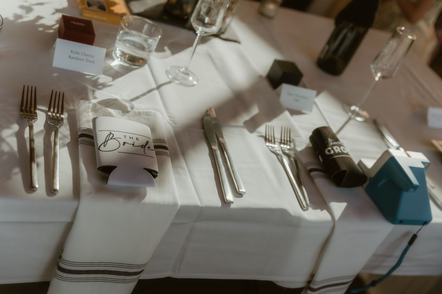 Detail photo of bride and groom table during cocktail hour with michigan wedding photographer