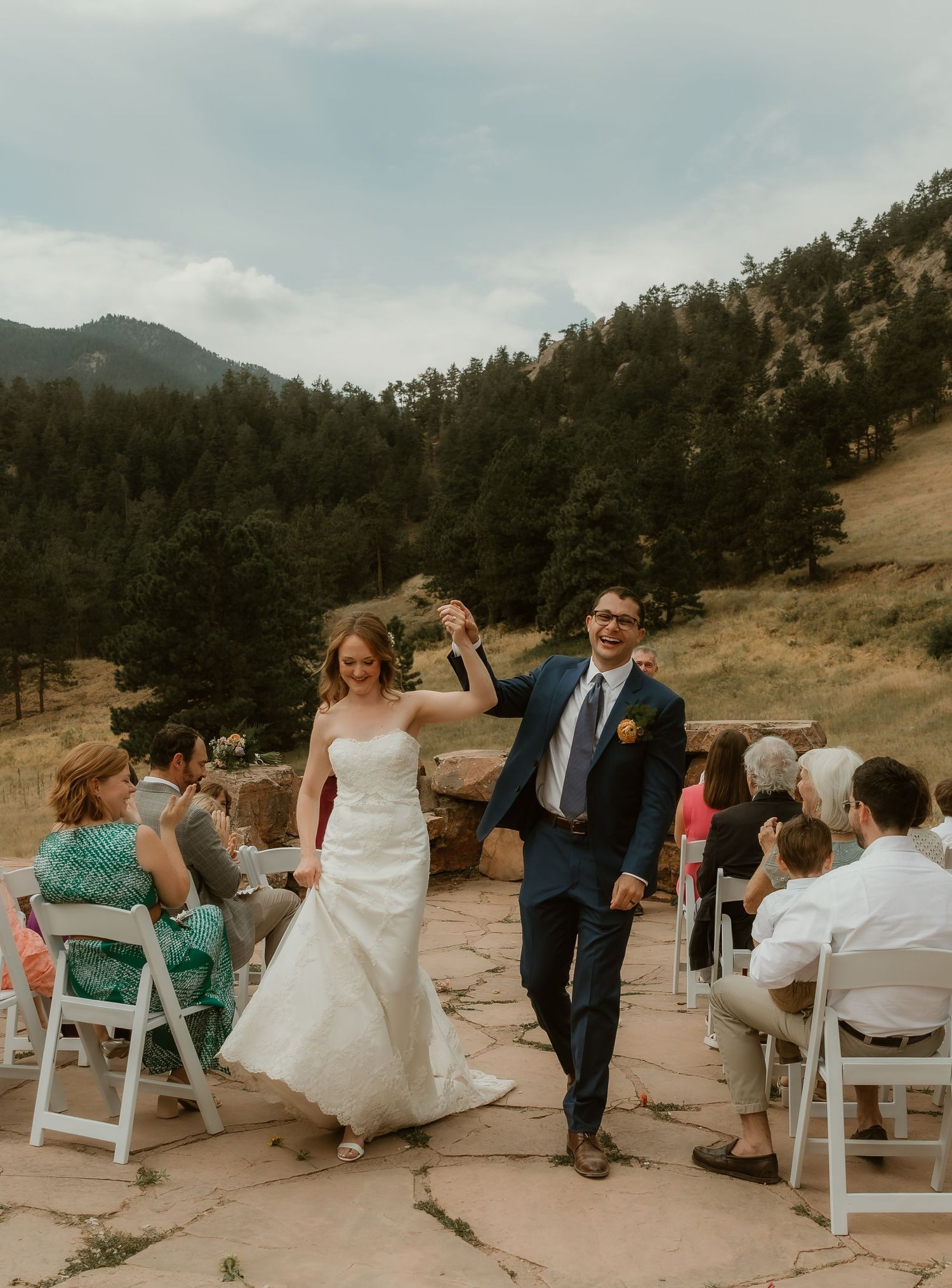 Bride and Groom walking away from the alter after their wedding ceremony ended in happiness
