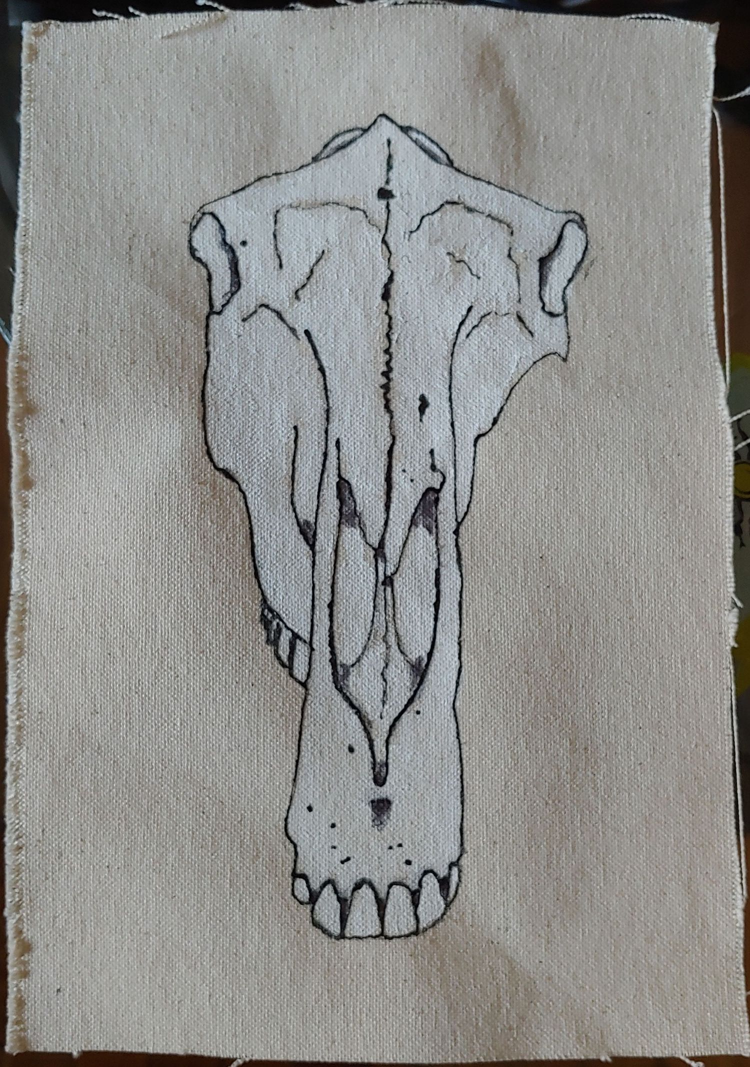 Sagittarius skull tattoo design on canvas with gesso and temporary tattoo ink.