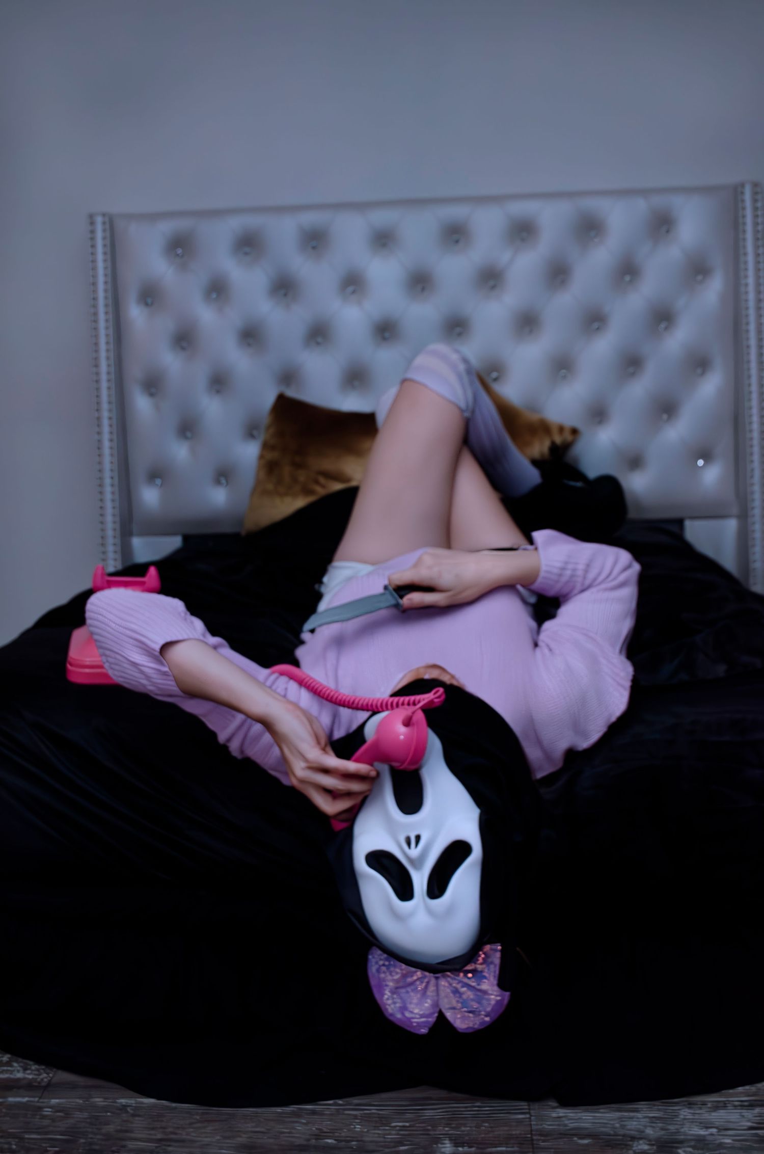 Photo phone call with a colorful Ghostface enjoying what she does best.