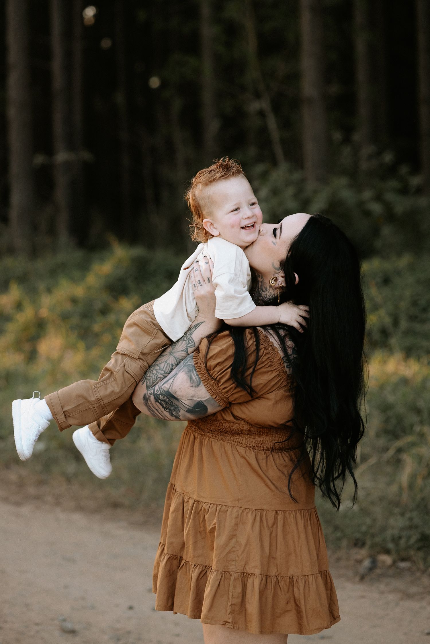 A joyful moment captured in a series of photos showing playful interaction between two people in a forest setting.