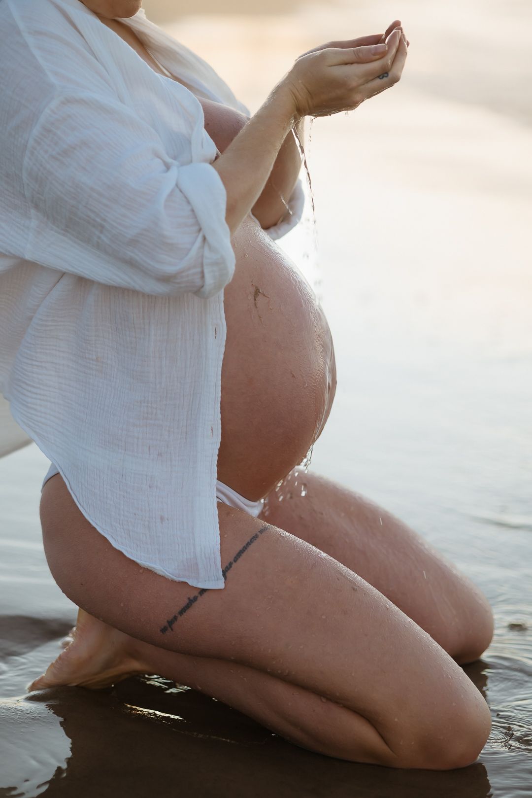 A series of artistic maternity photos showing a pregnant woman in a white shirt sitting by water at sunset.