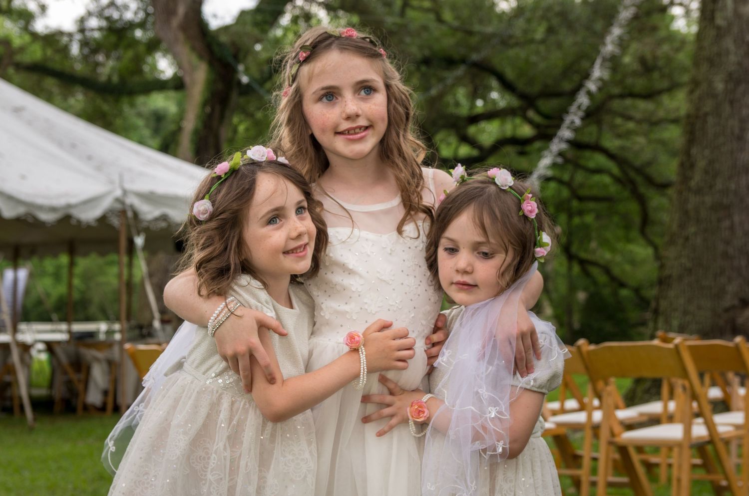 Three young girls at a wedding