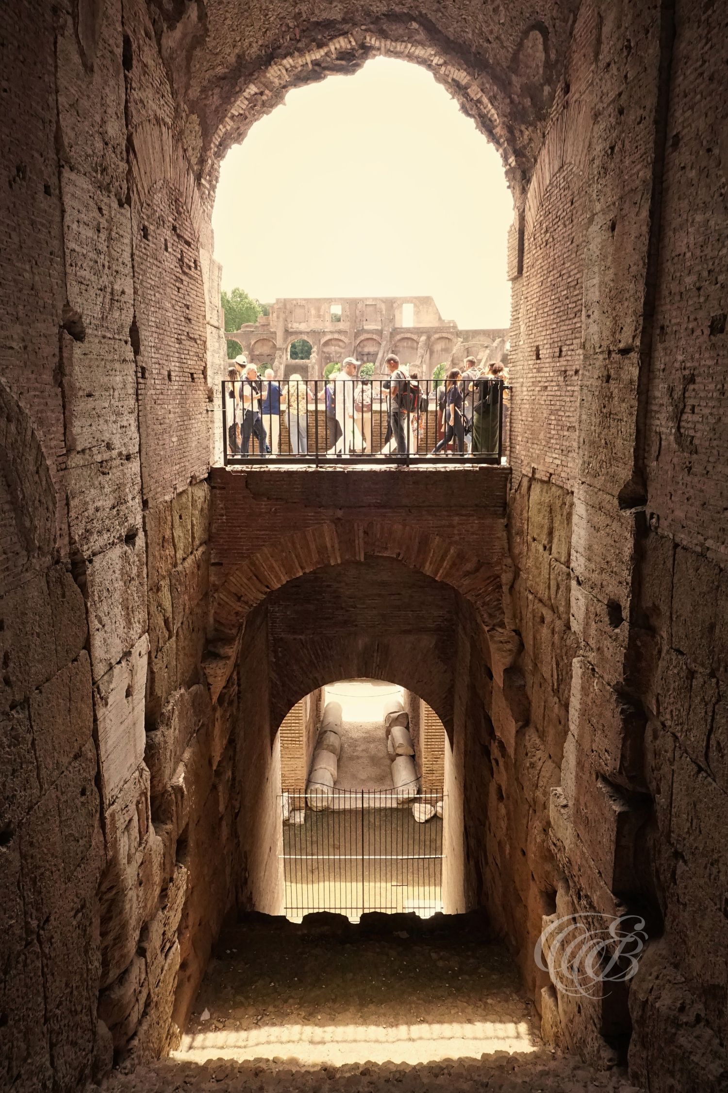 Italy – Colosseum interior arches - Rome – ancient stone arches inside the Roman amphitheater, photograph by Eduardo Bartoli