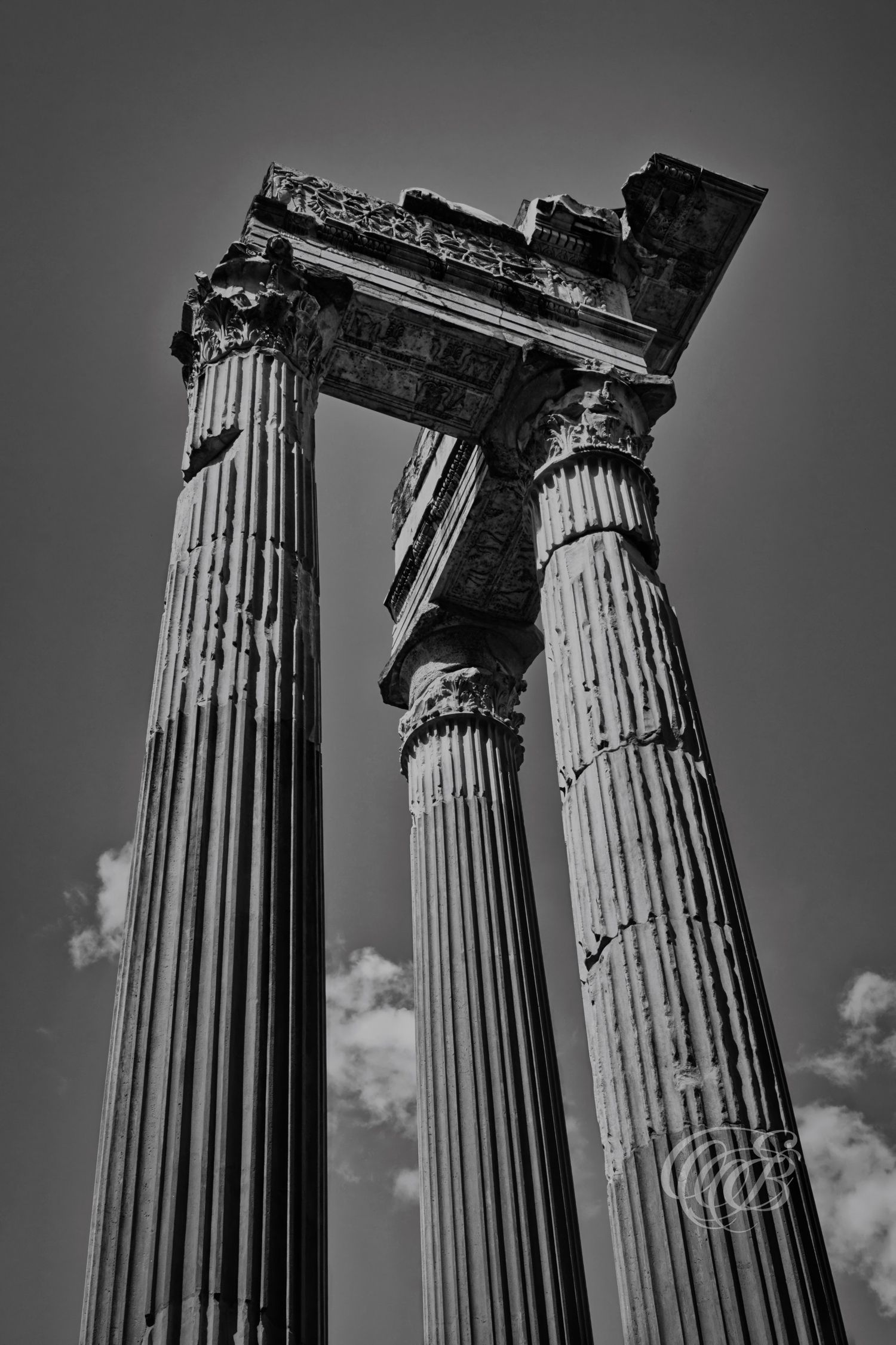 Italy – Columns of Apollo Sosianus and Bellona temples - Rome – black and white photo of ancient Roman temple ruins, by Eduardo Bartoli