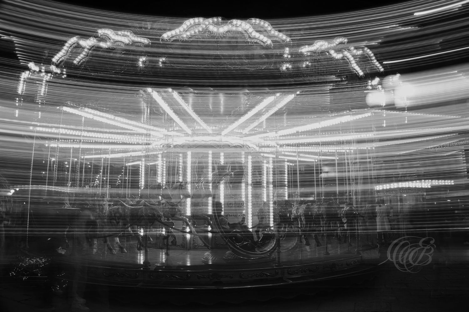 Italy – carousel in Piazza della Repubblica - Florence – black and white photo of the historic carousel in motion, by Eduardo Bartoli