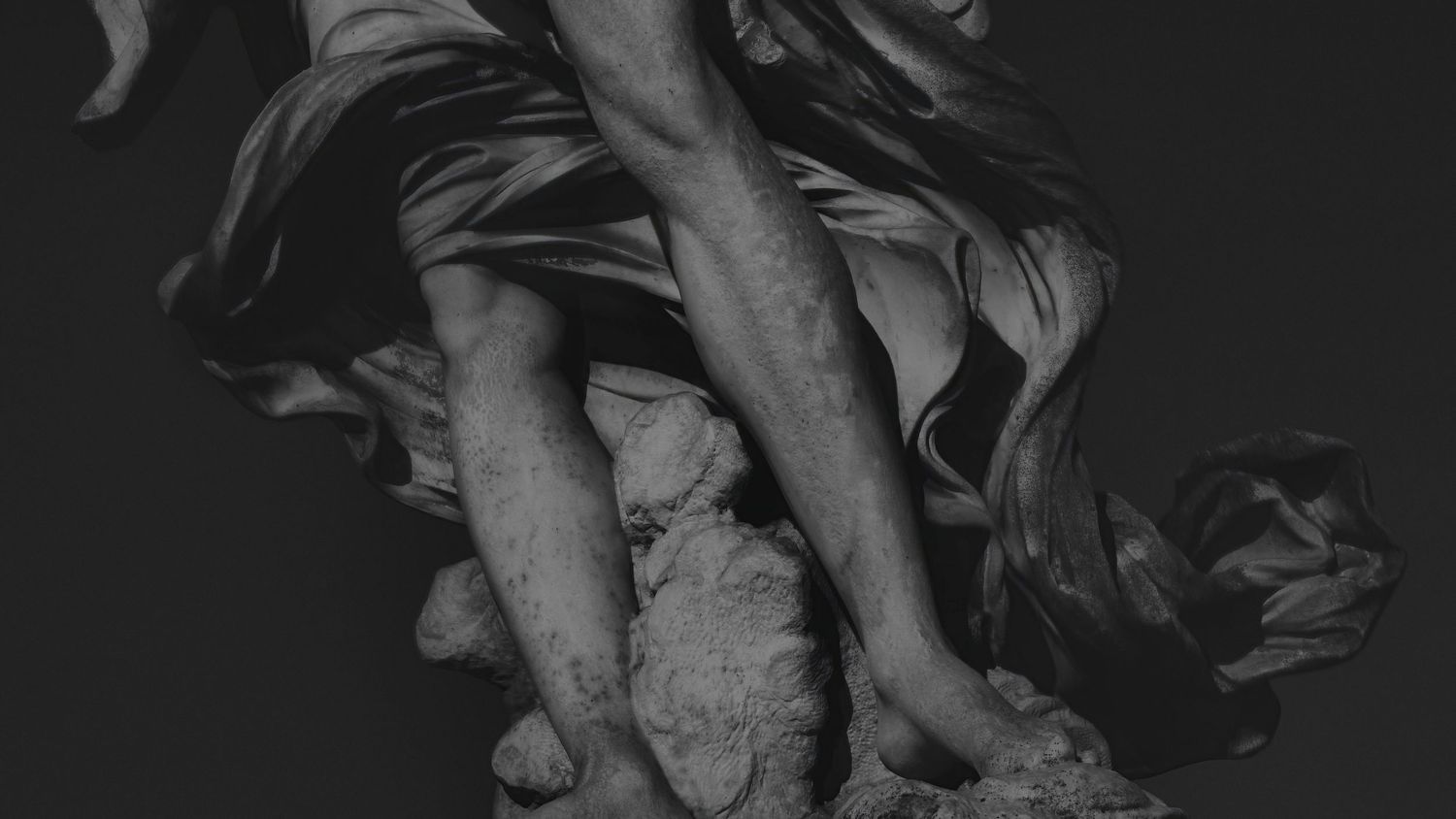 Italy – angel feet at Ponte Sant’Angelo - Rome – black and white photo of baroque sculpture detail, by Eduardo Bartoli