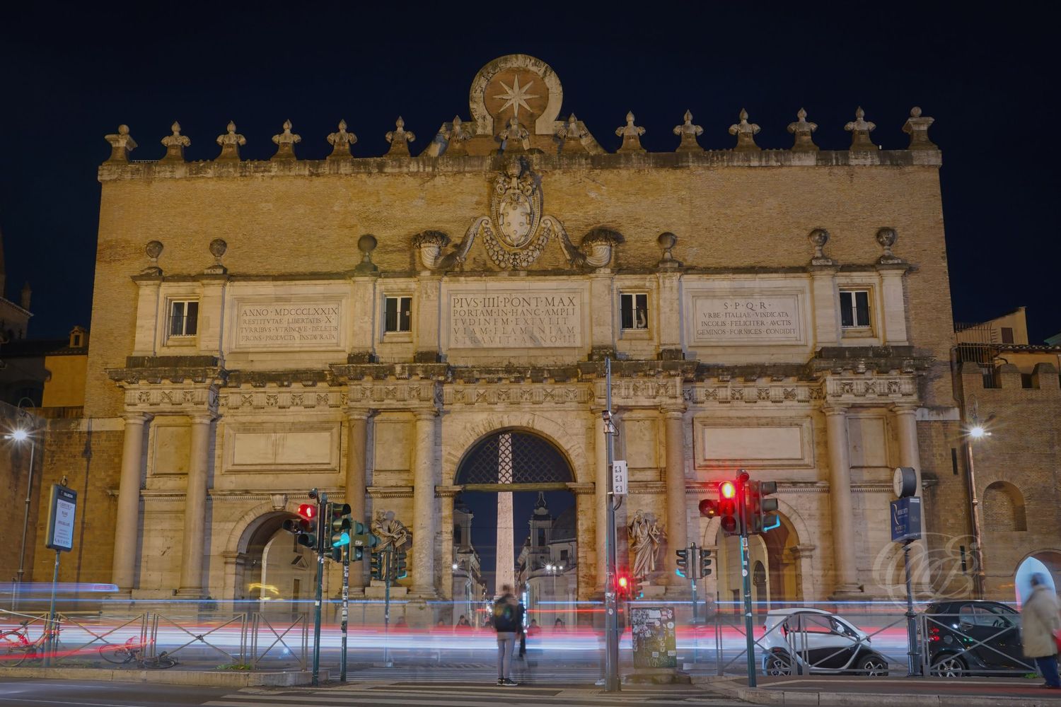 Italy – Porta del Popolo long exposure - Rome – historic city gate illuminated at night, photograph by Eduardo Bartoli