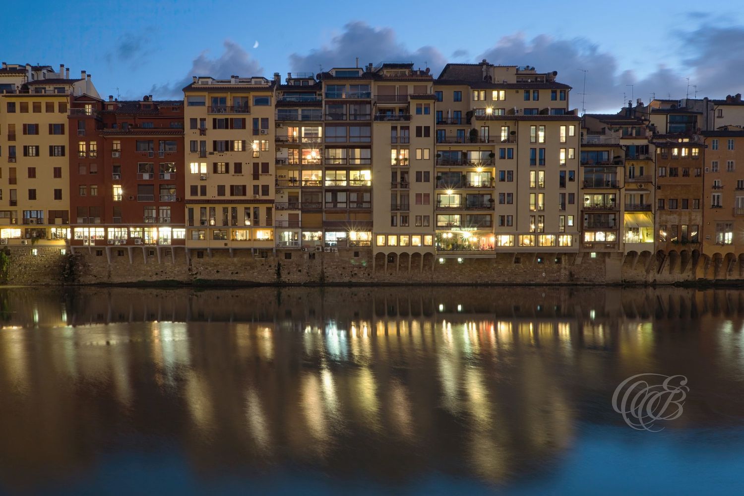 Italy – afternoon on the Arno River - Florence – view of the river and historic bridges, photo by Eduardo Bartoli