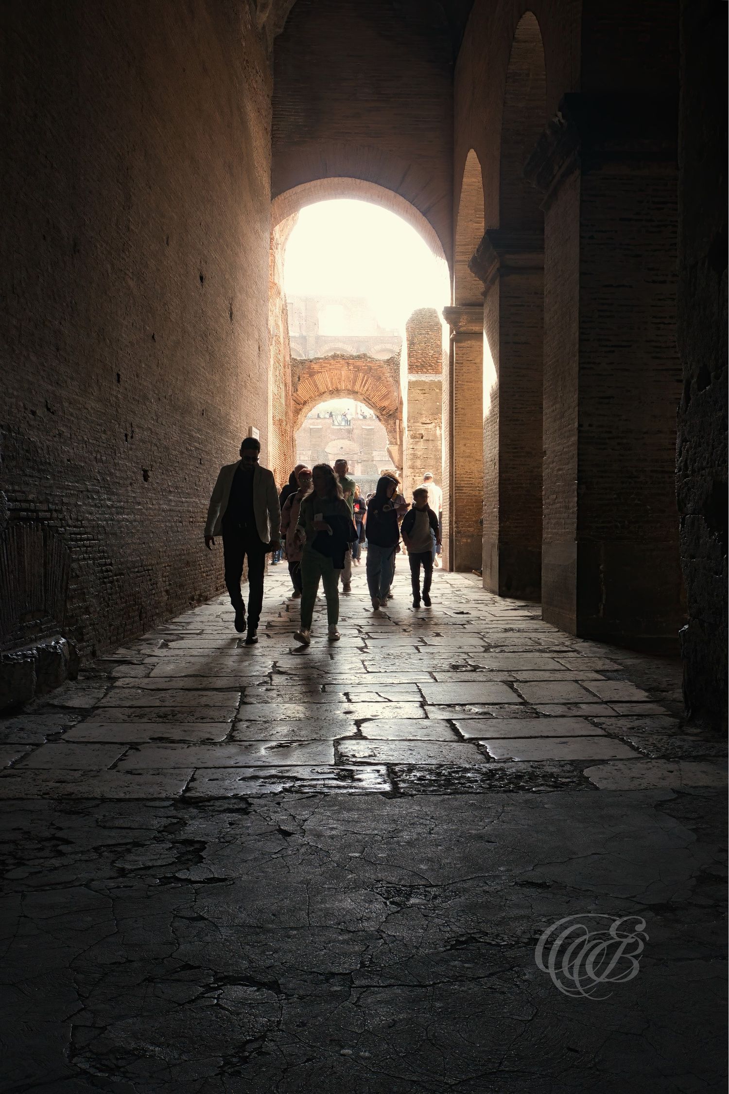 Italy – Colosseum vaulted tunnels - Rome – ancient stone corridors beneath the Roman amphitheater, photograph by Eduardo Bartoli