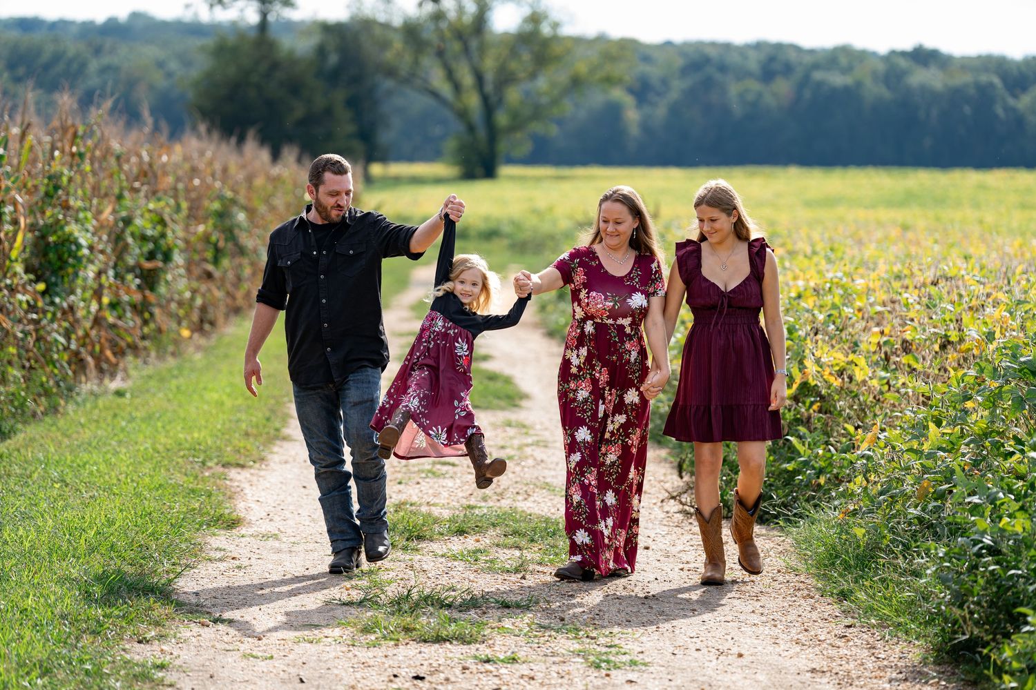 Candid walking shots along a nature path bordered by wildflowers.