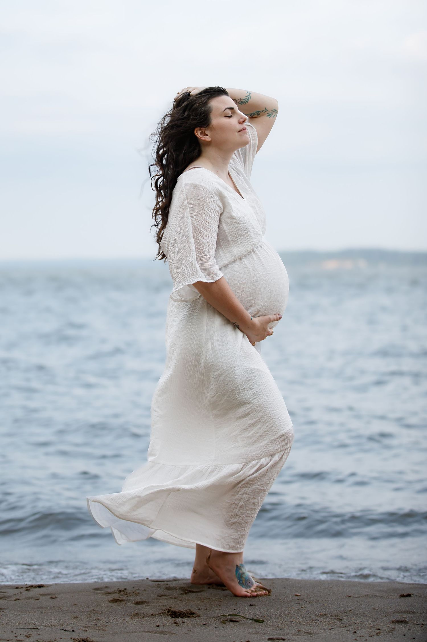 A sequence of artistic beach photos showing a person in a flowing white dress dancing by the ocean waves.