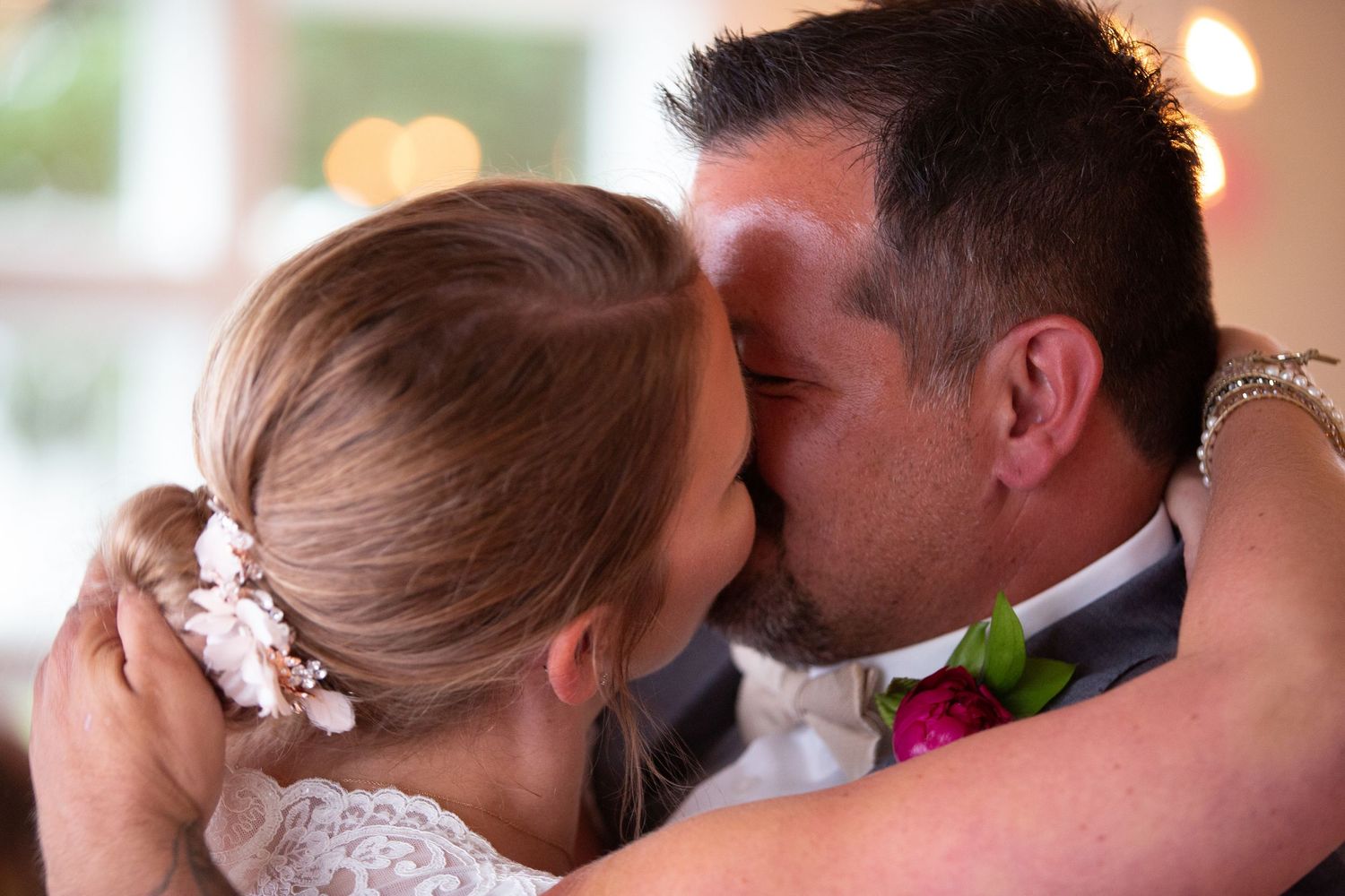 Intimate moments captured between newlyweds during their wedding celebration.