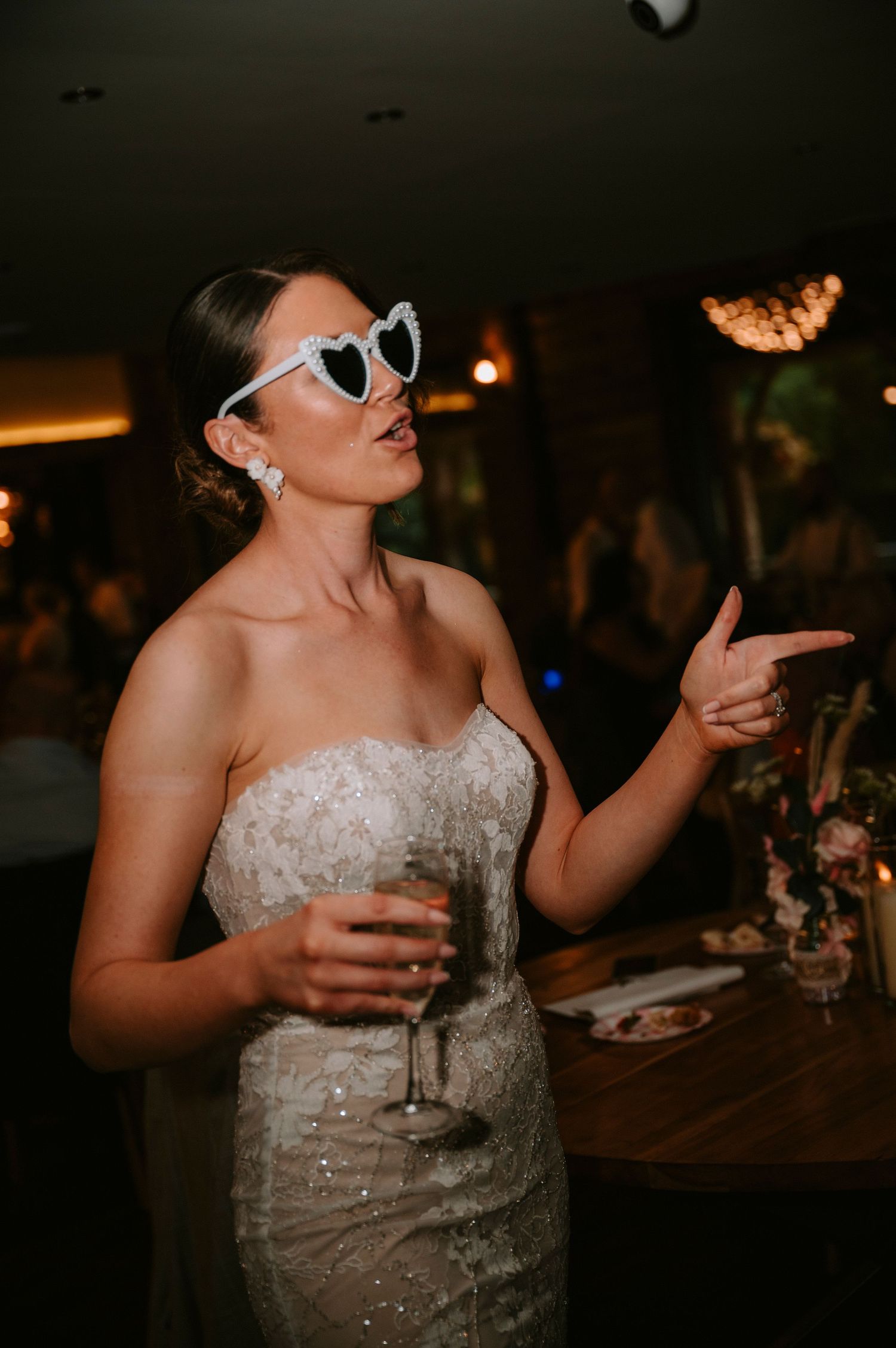 A wedding celebration sequence showing dancing and fun moments at an evening reception.