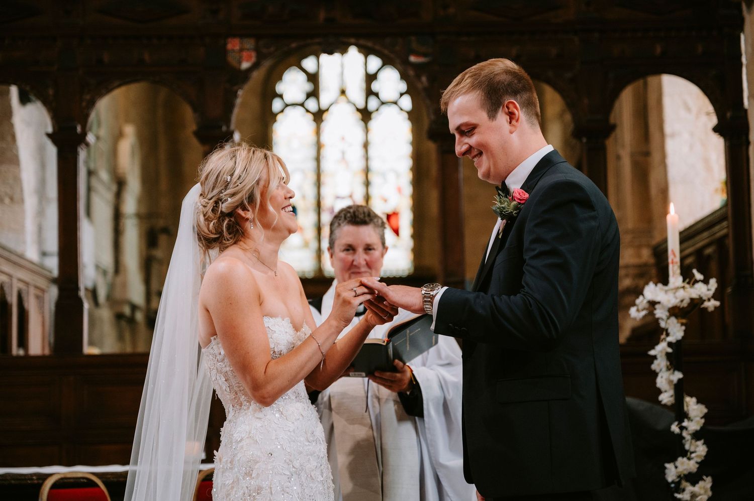 Exchange of rings during a traditional church wedding ceremony.