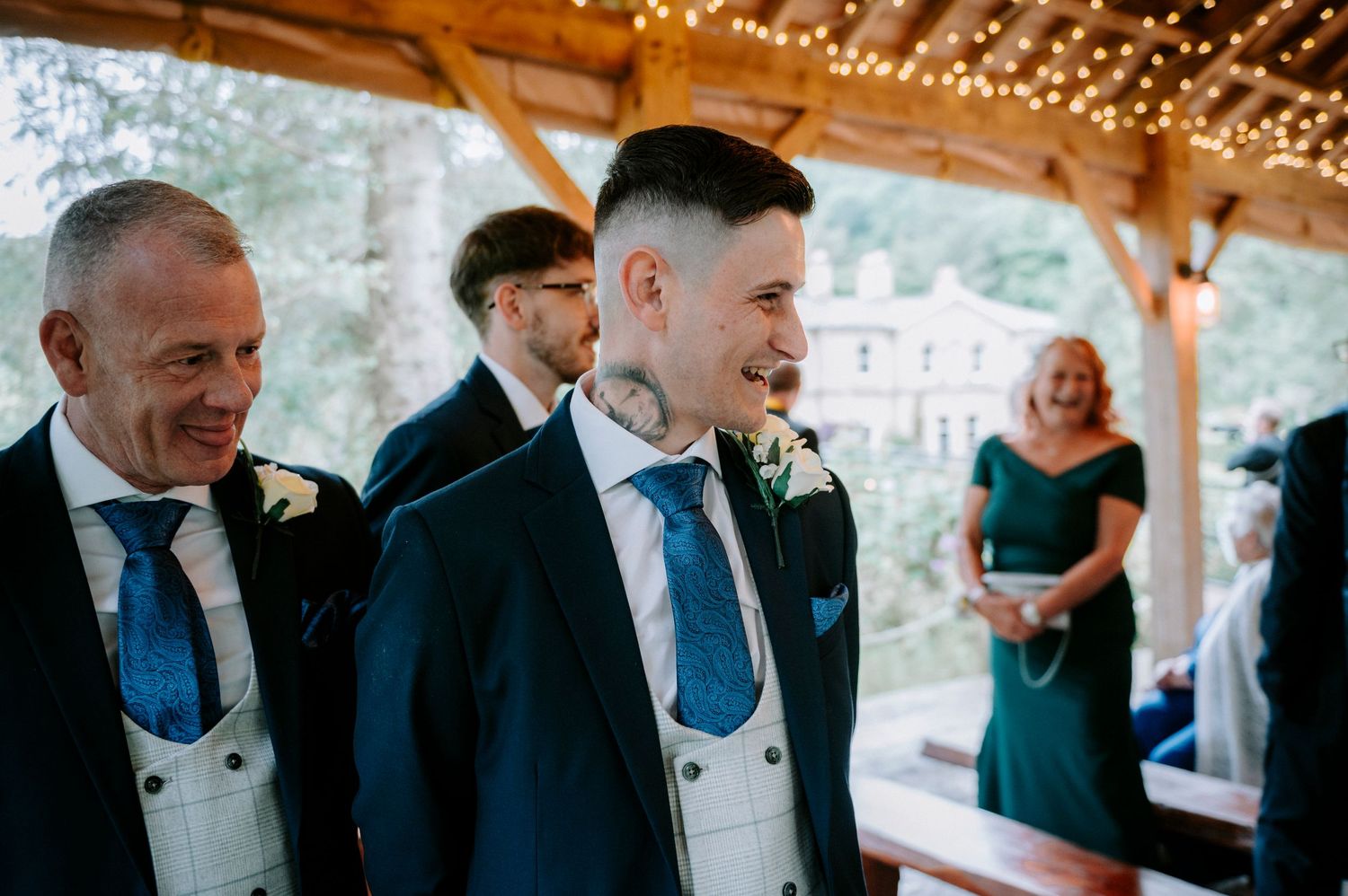 Wedding reception venue with warm string lights creating an intimate atmosphere.