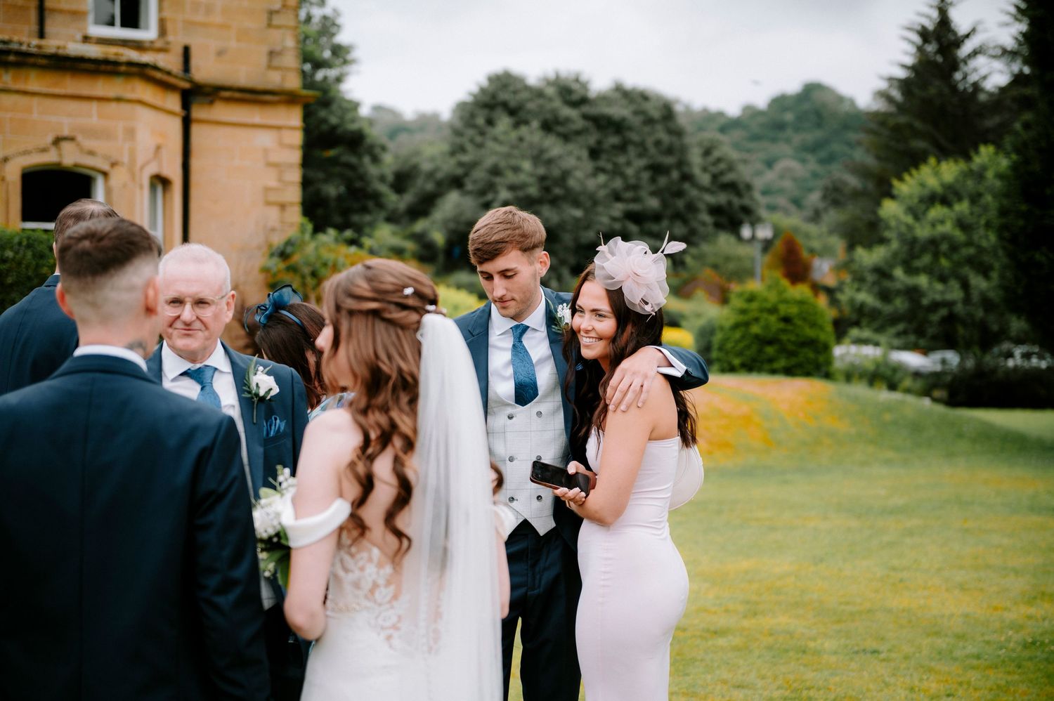 Candid moments captured during outdoor wedding photo session.