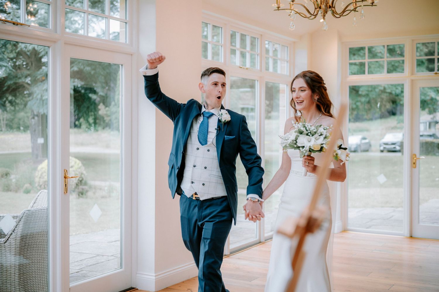 Wedding celebration scenes in a bright indoor venue with white drapes and windows.