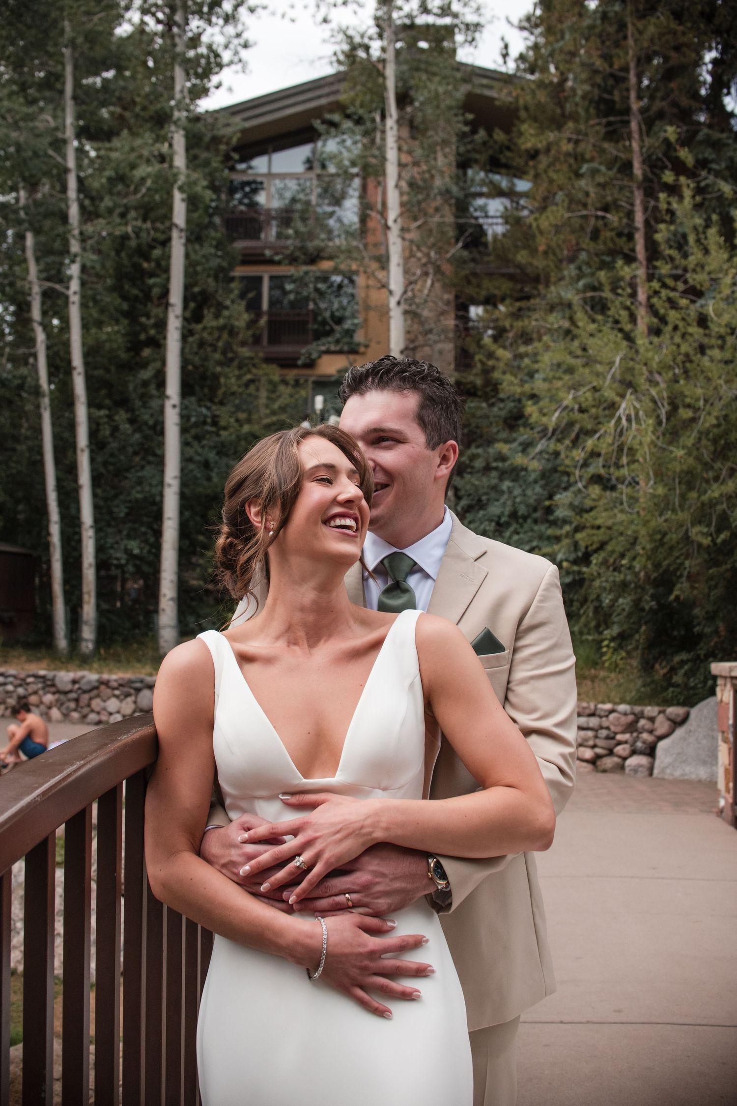 Strolling with the bride and groom on their wedding day at Donovan Pavilion in Vail Village for candid wedding photography.