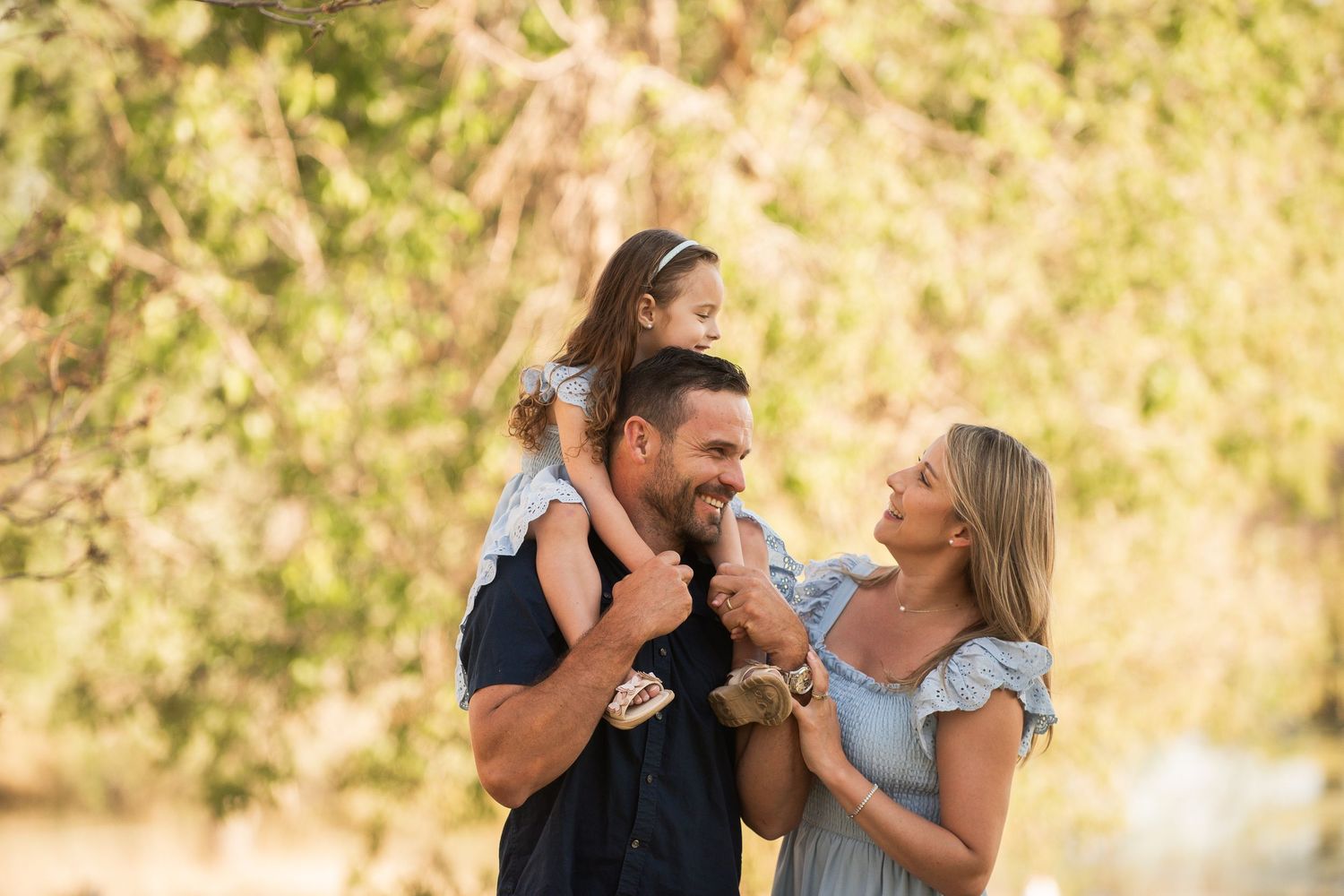 Family photography, child on father's shoulders, true to life colors,  Sandstone Ranch, Longmont by Angelice Caballer