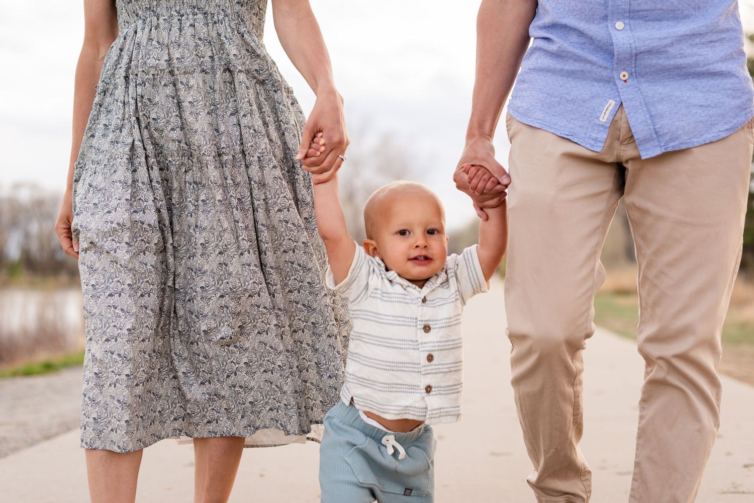 Family photography, playful ideas, baby walking pose at Golden Ponds, Longmont, CO, photography true-to-life by Angelice Caballler