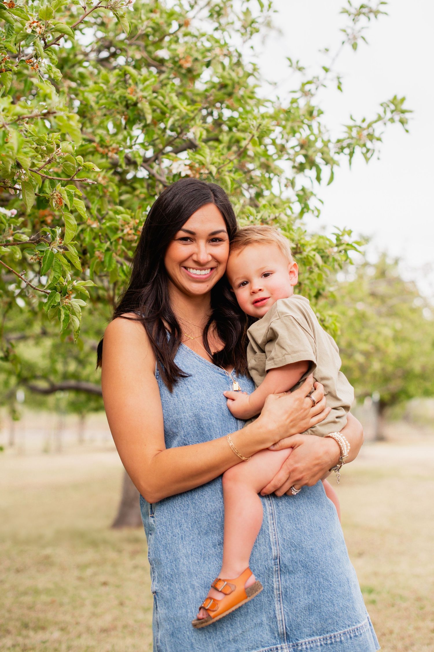 Family photography, Mother and son pose idea, true to life colors, spring  apple orchard at Rogers Grove, Longmont by Angelice Caballer