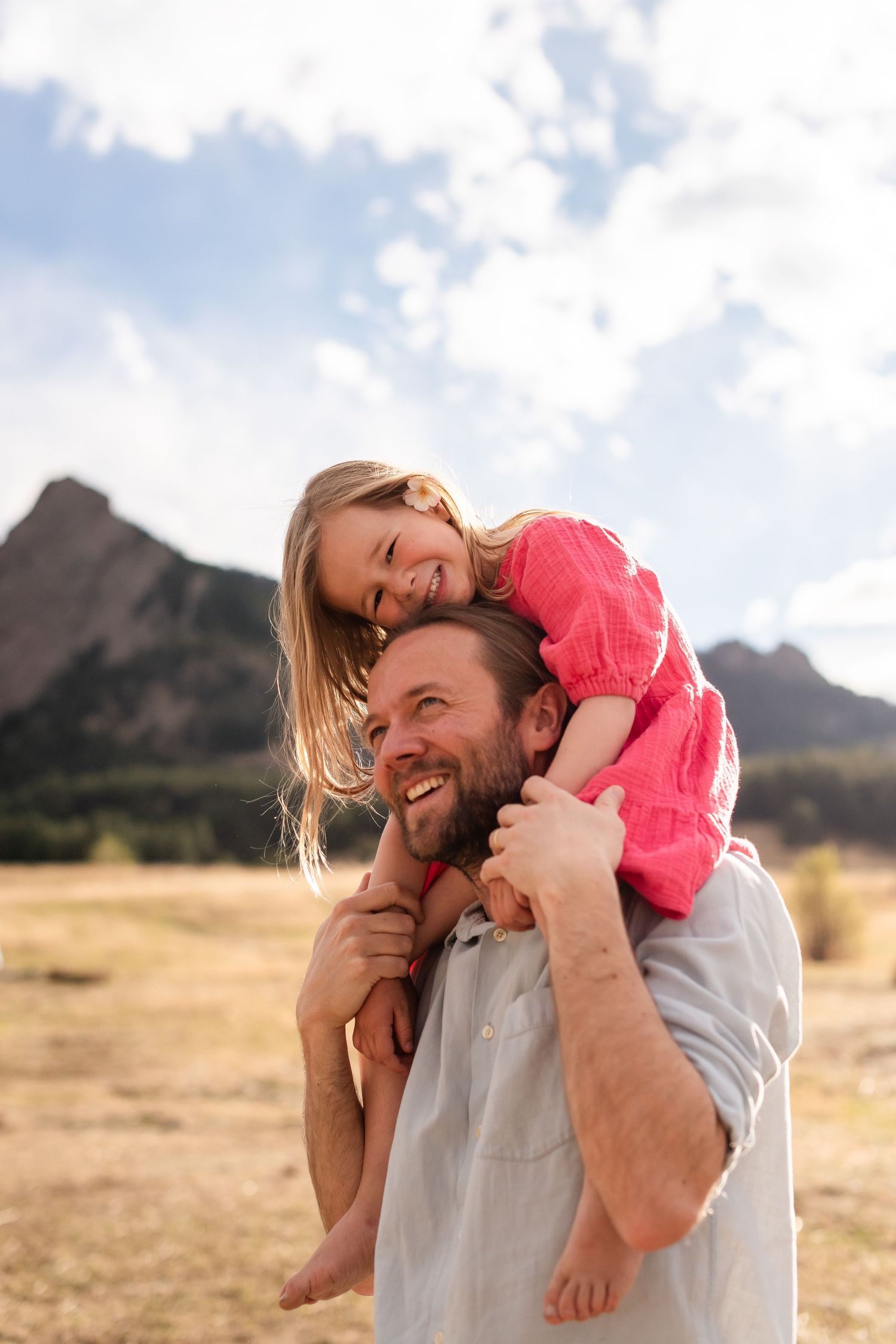 Photography of a family playful movement father  ideas, True to Life color at Chautauqua Park, Boulder, CO, photography by Angelice Caballer