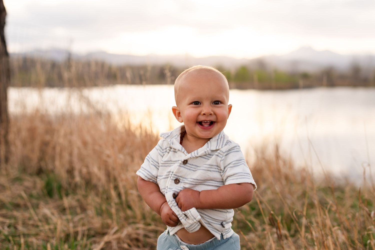 Family photography, playful ideas, close-up baby photo at the Golden Ponds, Longmont, CO, photography true-to-life by Angelice Caballler