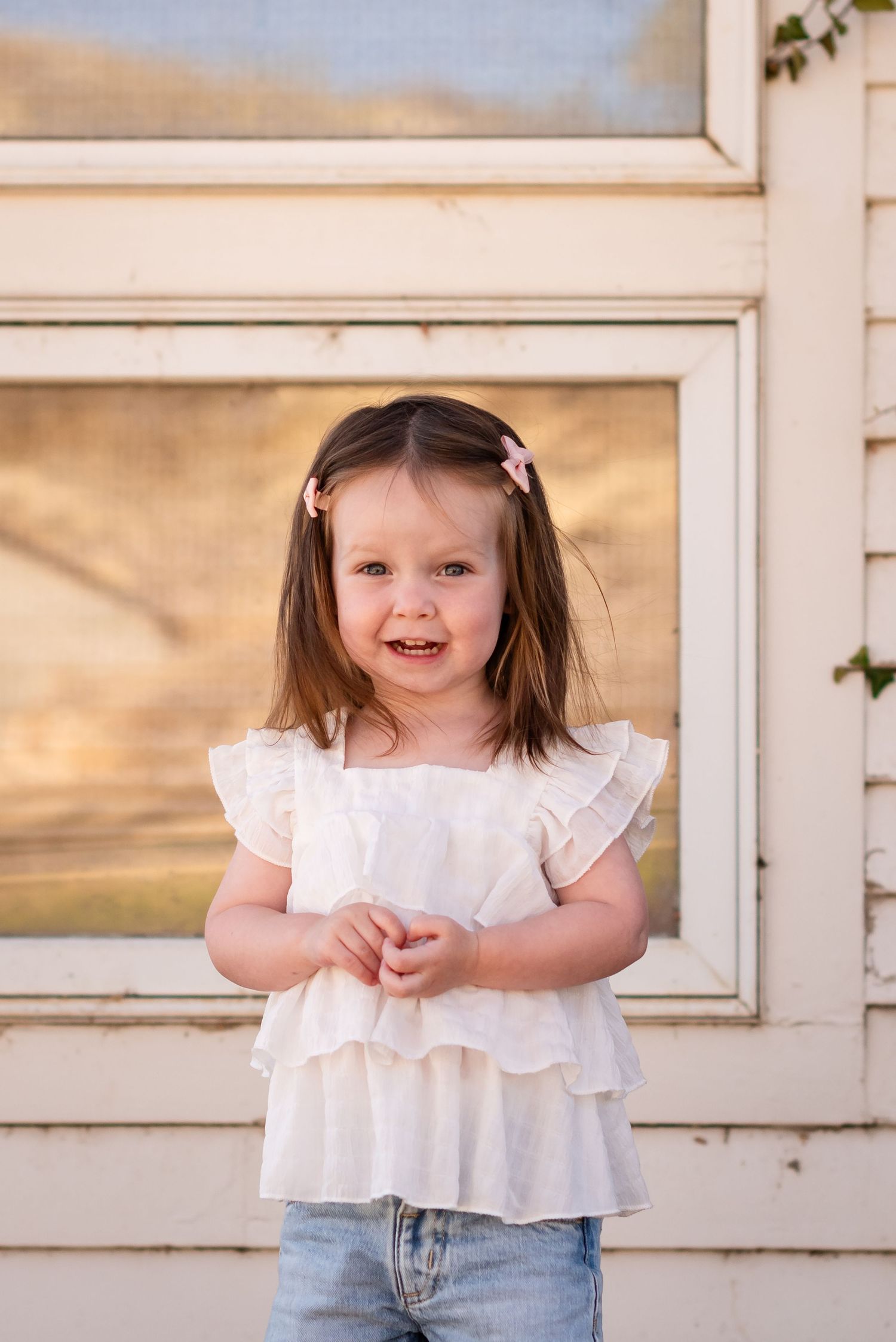 Family photography, a child poses, true to life colors,  Sandstone Ranch, Longmont by Angelice Caballer