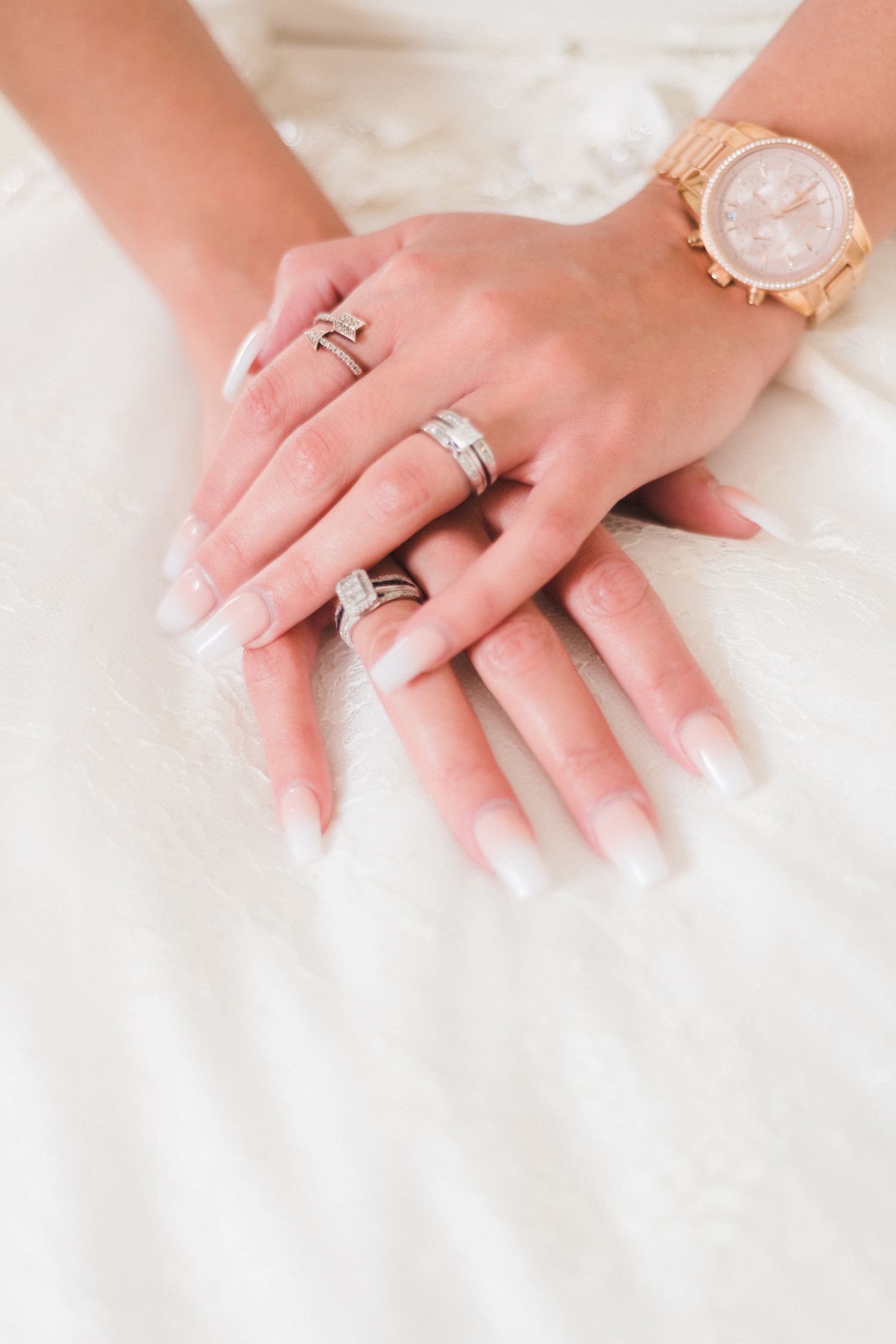 The bridal photo offers simple, elegant inspiration for wedding rings and jewelry.
