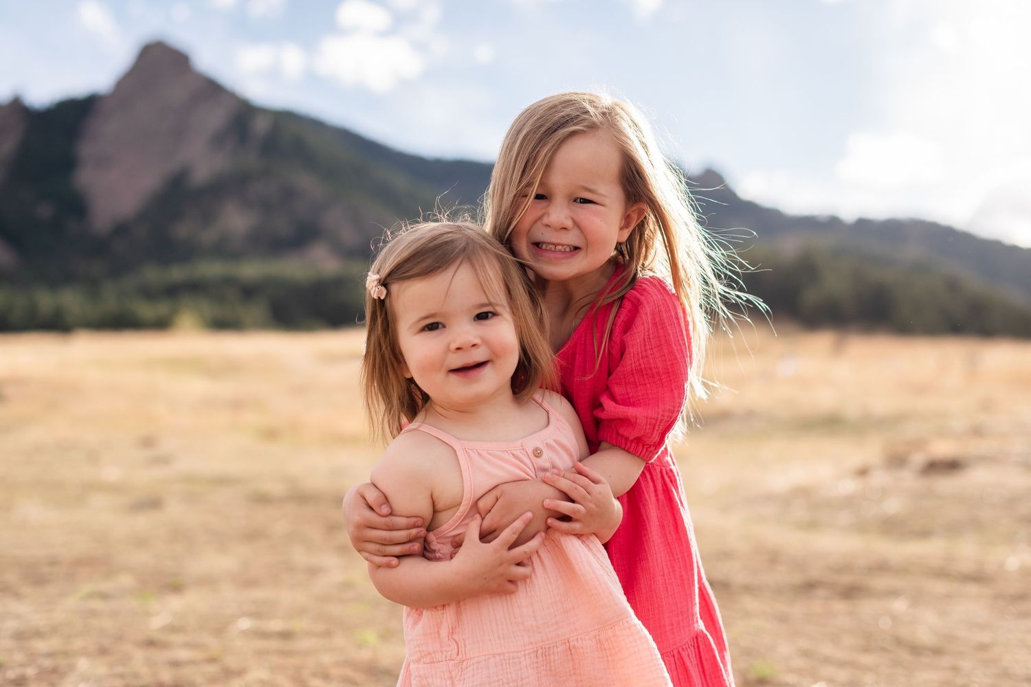 Photography of a family playful sibling ideas, True to Life color at Chautauqua Park, Boulder, CO, photography by Angelice Caballer