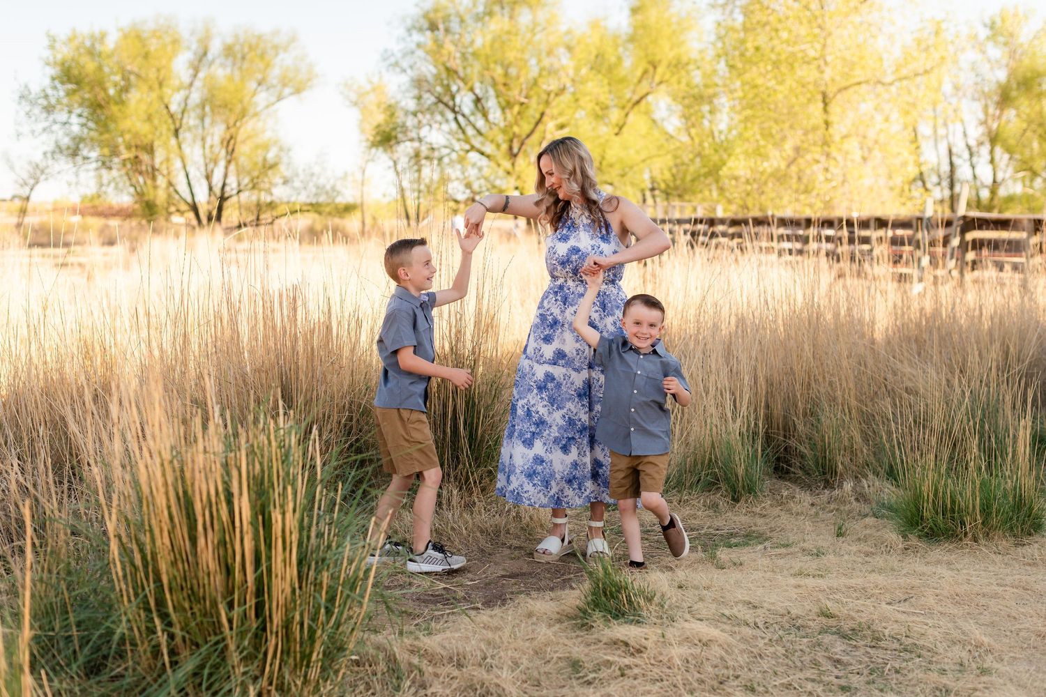 Family photography, Mother dancing with sons, true to life colors,  Sandstone Ranch, Longmont by Angelice Caballer