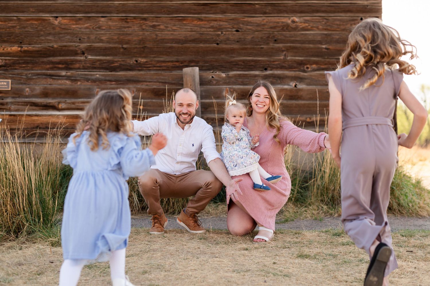Family photography, children running to parents, true to life colors,  Sandstone Ranch, Longmont by Angelice Caballer