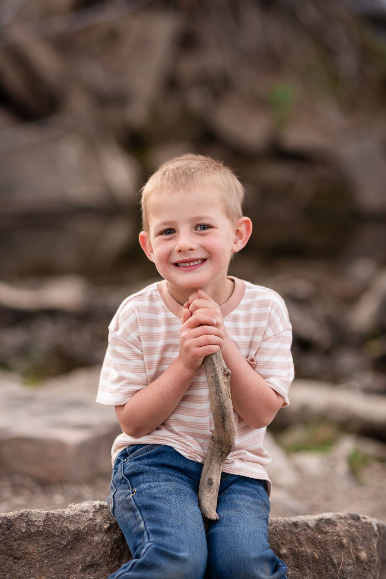 Family photography, playful ideas, child pose at waterfall, Golden Ponds, Longmont, CO, photography true-to-life by Angelice Caballler