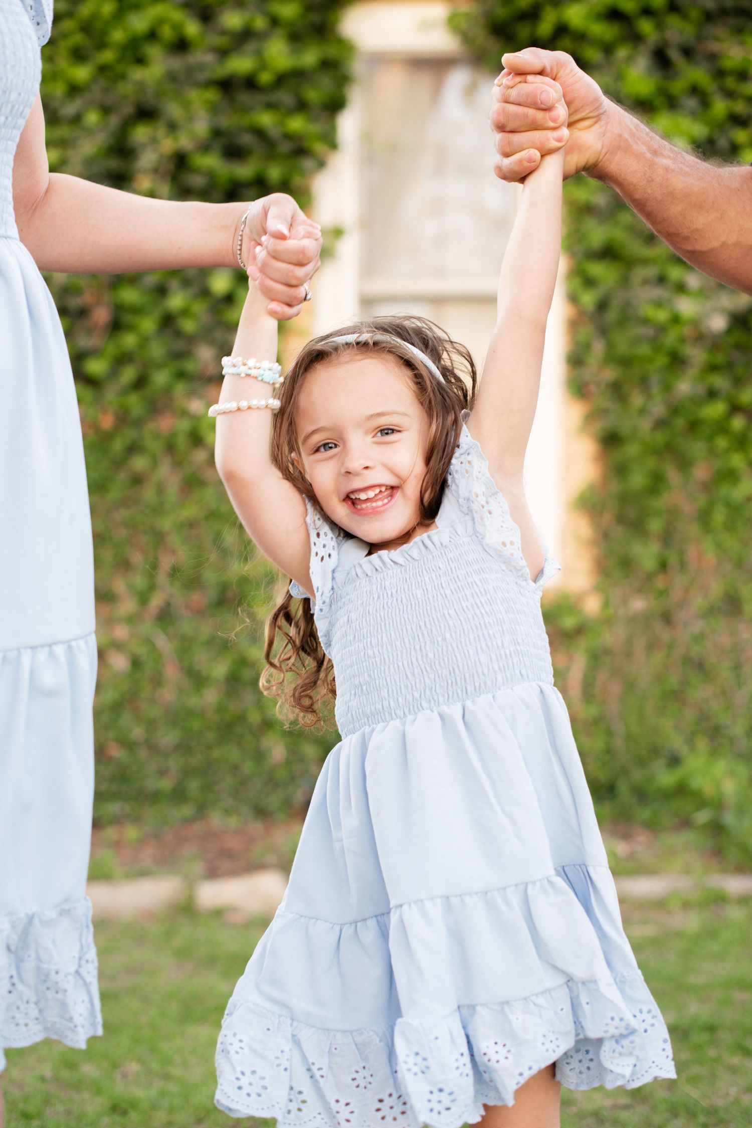 Longmont-CO-family-photographer-outdoor-session, candid and playful photography of parents and child.