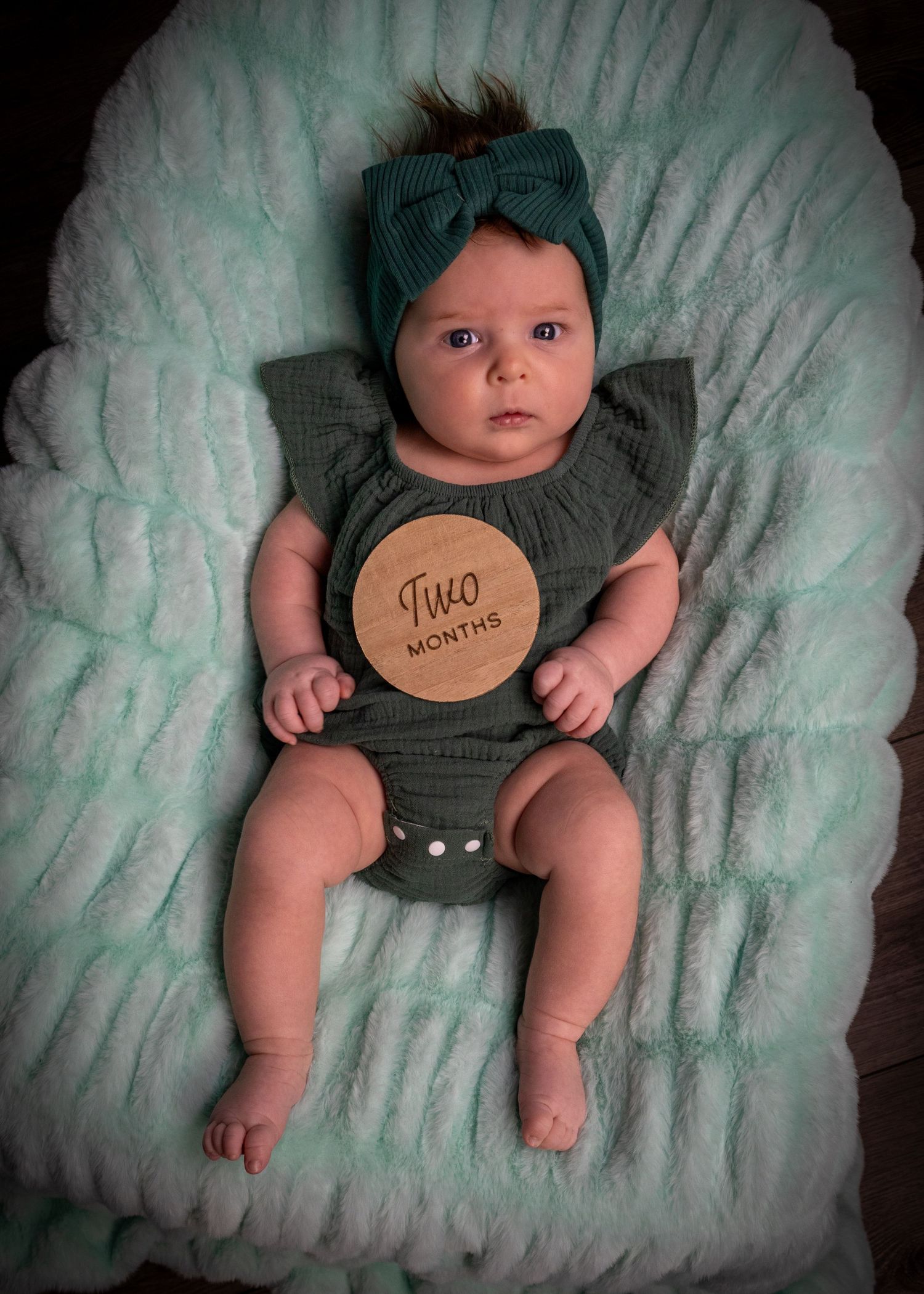 Baby milestone photography session with monthly marker Kansas City newborn photographer