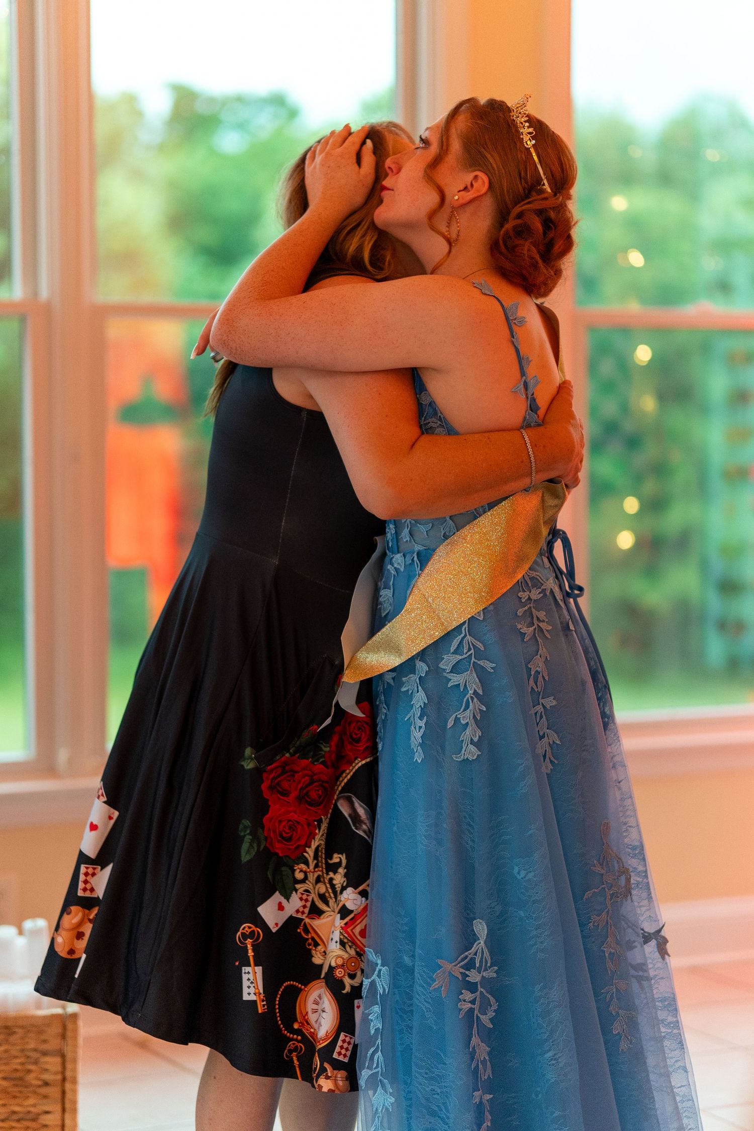 Mom and daughter dancing and hugging at the daughters 16th birthday party In Bel Air Harford County, Maryland